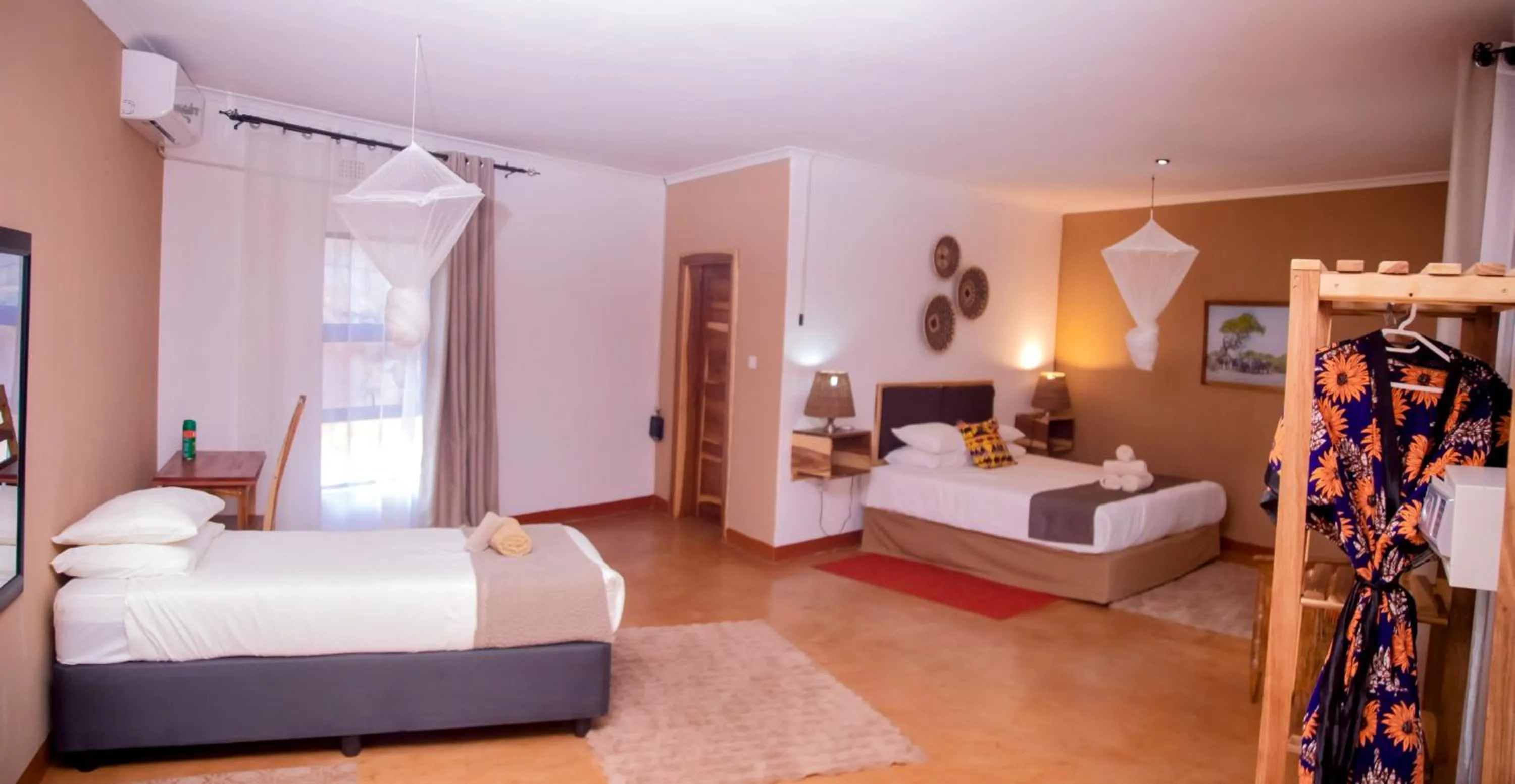 Bedroom in The Nkhosi Livingstone Lodge and Spa