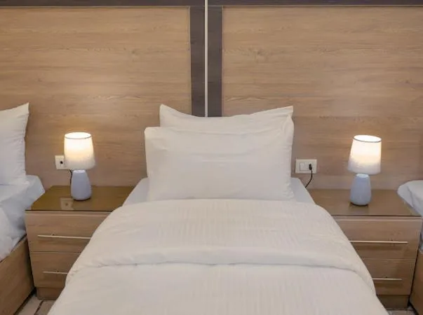 Bed in Beit Alshabaan Inn