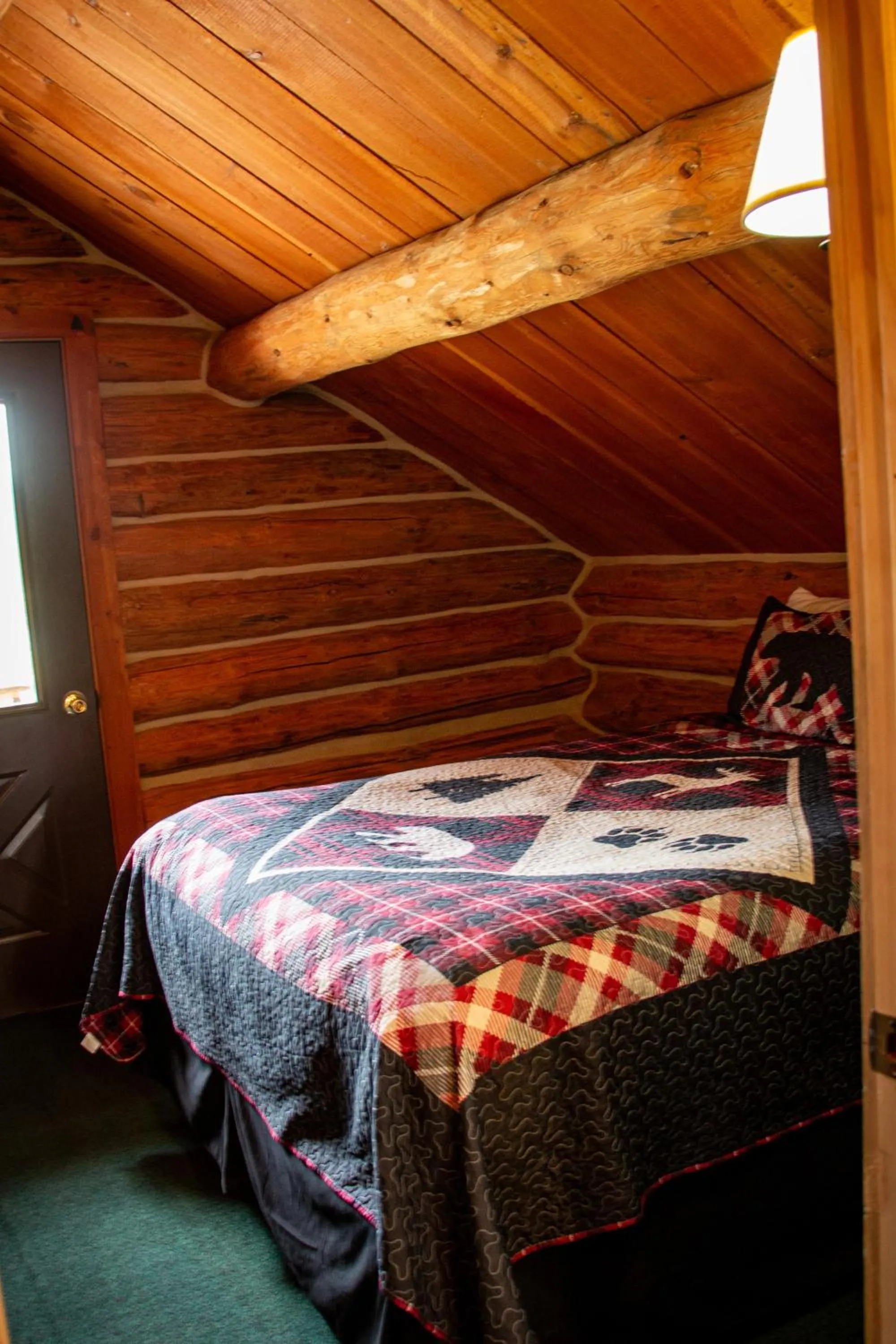 Bed in Crooked Creek Guest Ranch