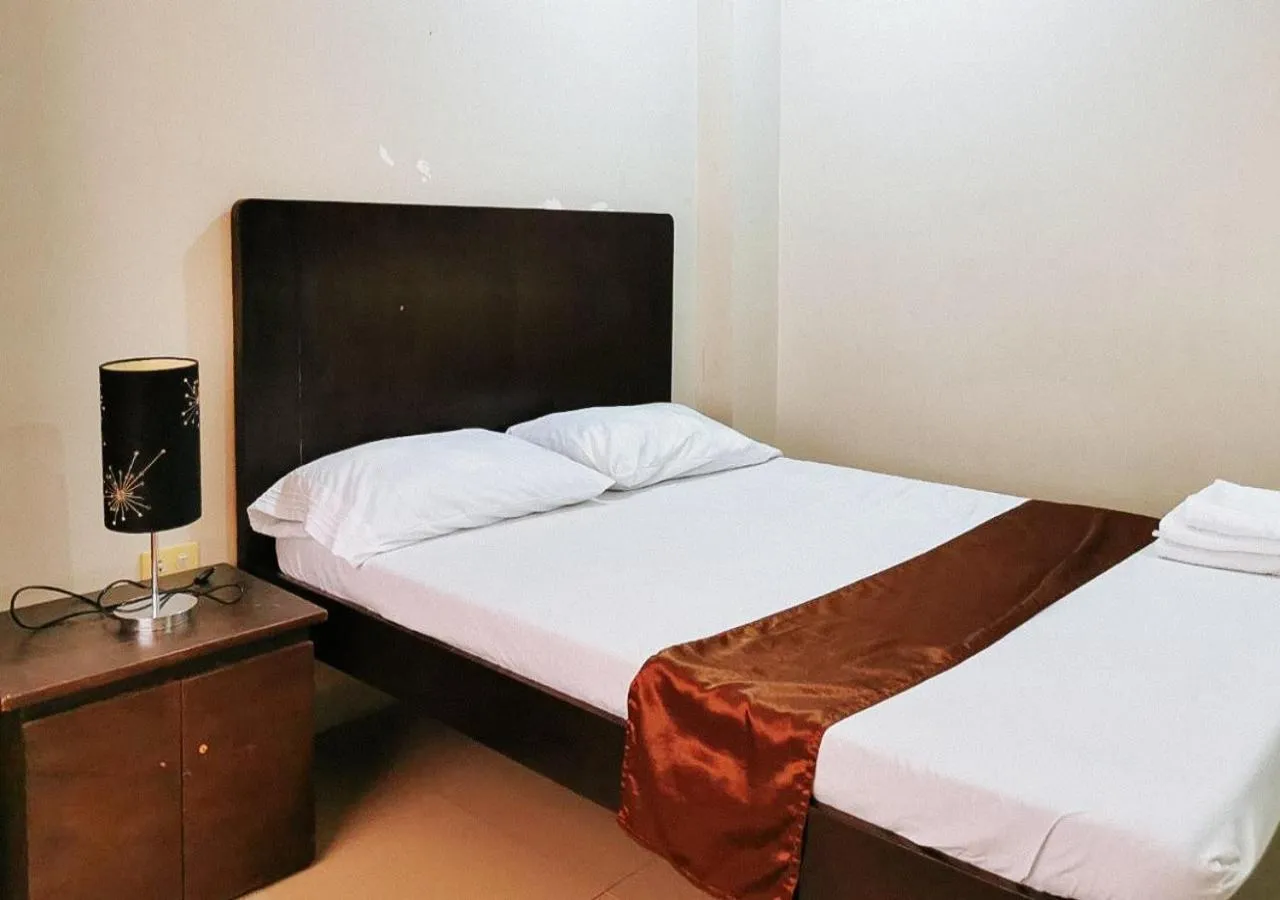 Bedroom, Bed in RedDoorz Segra Square Pension House