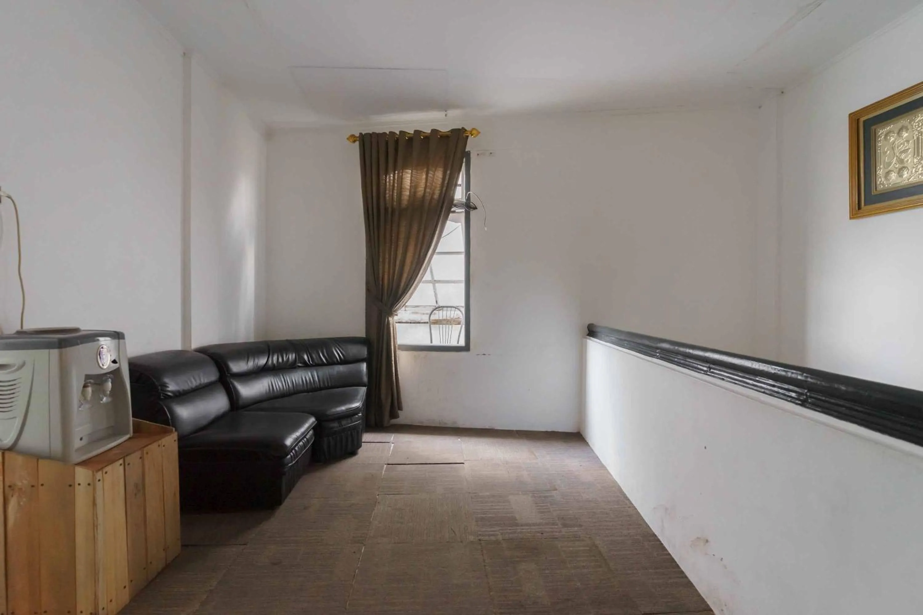 Living room in Urbanview Hotel Ananda Syariah by RedDoorz