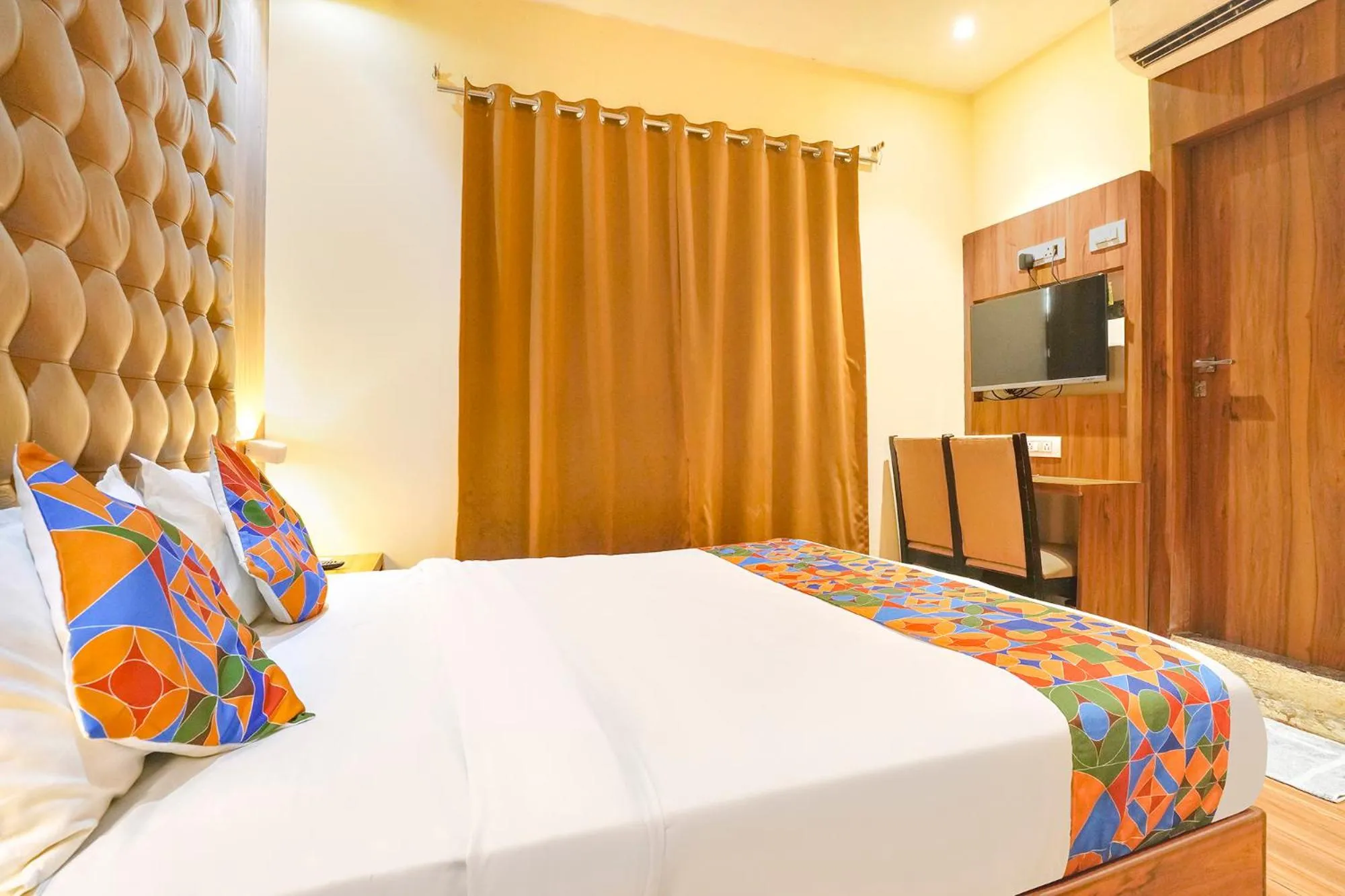 Bed in FabHotel Cozy Inn