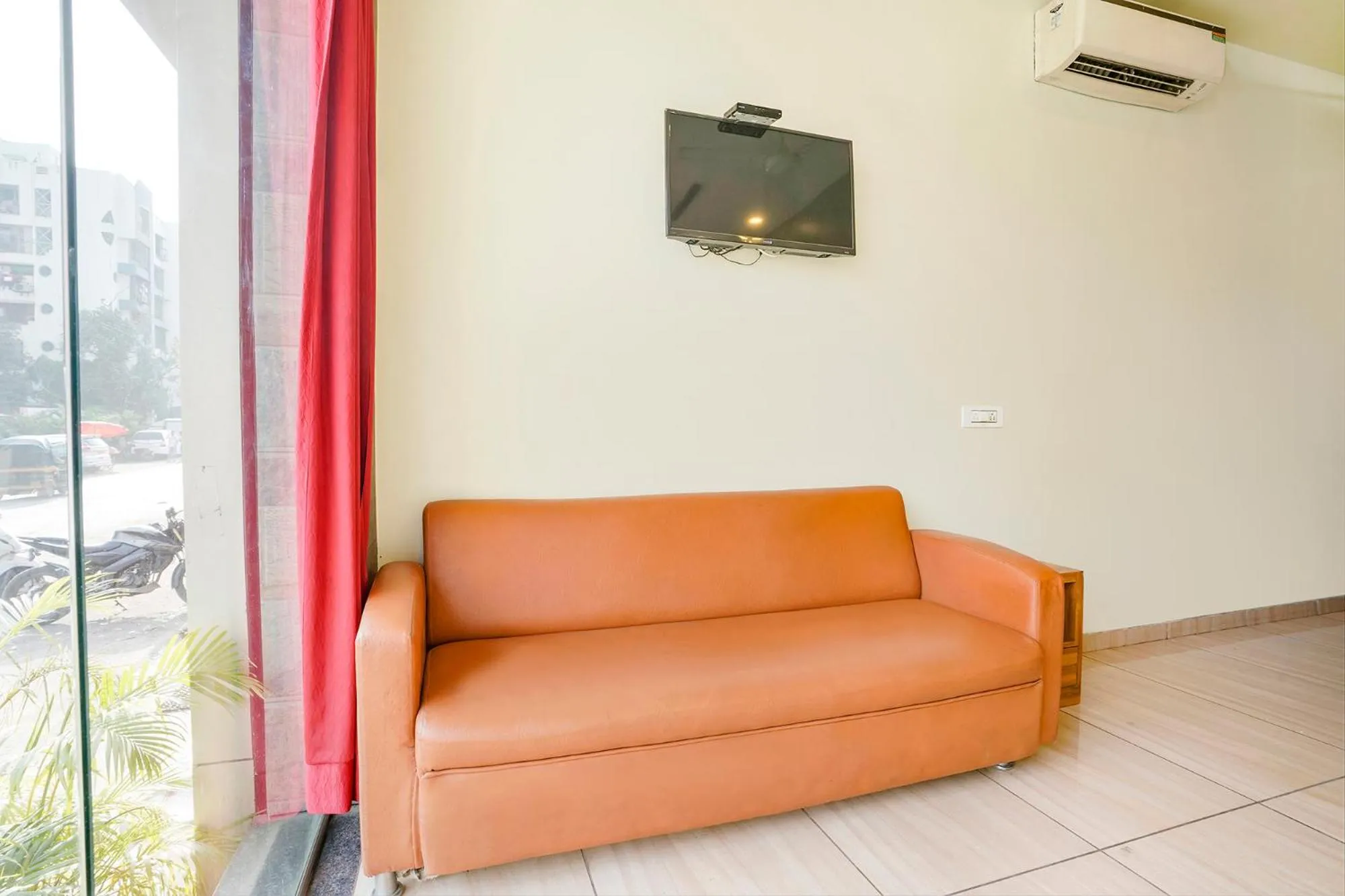 Seating area in FabHotel Cozy Inn