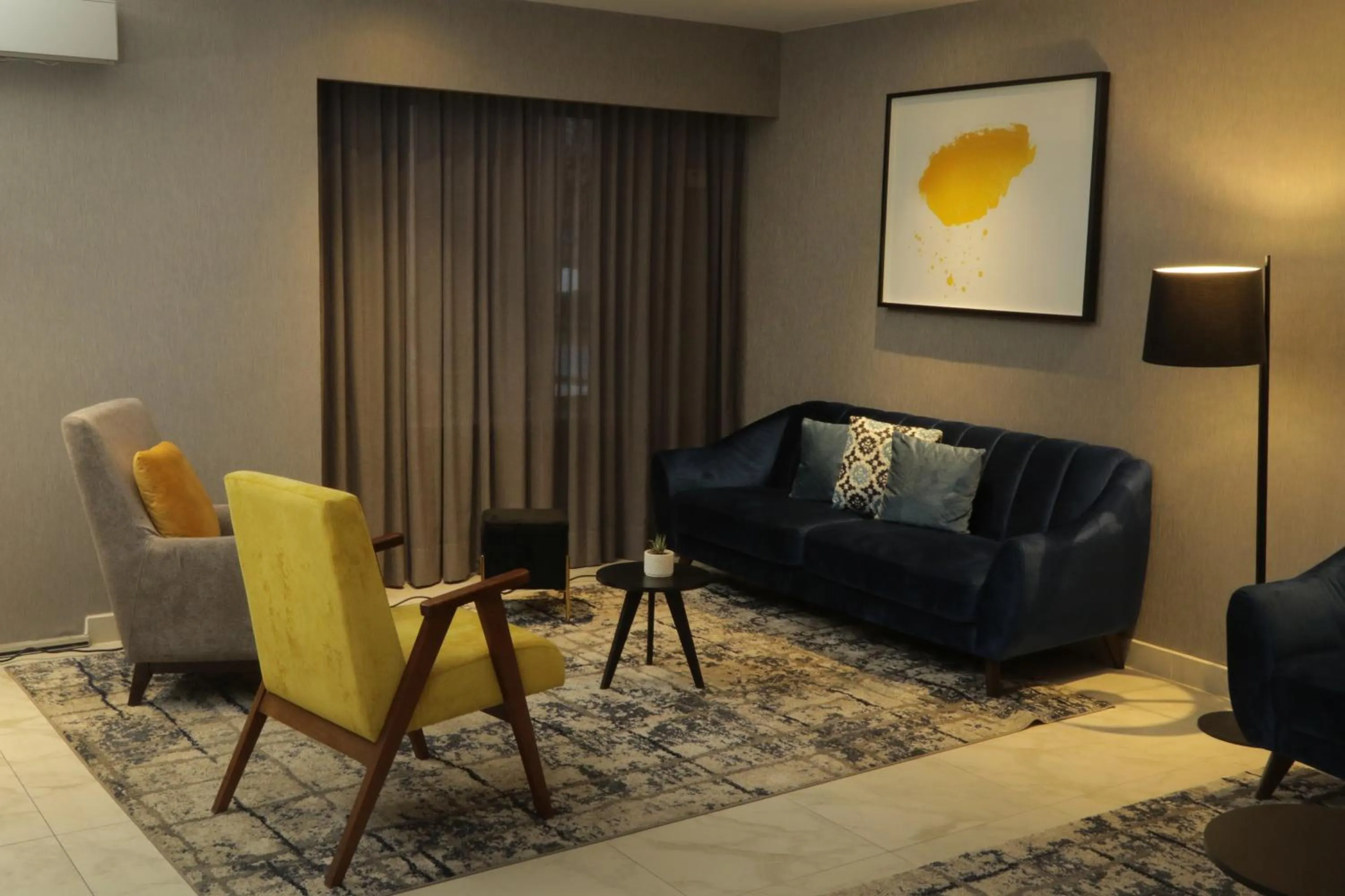 Lobby or reception in voco Saltillo Suites by IHG