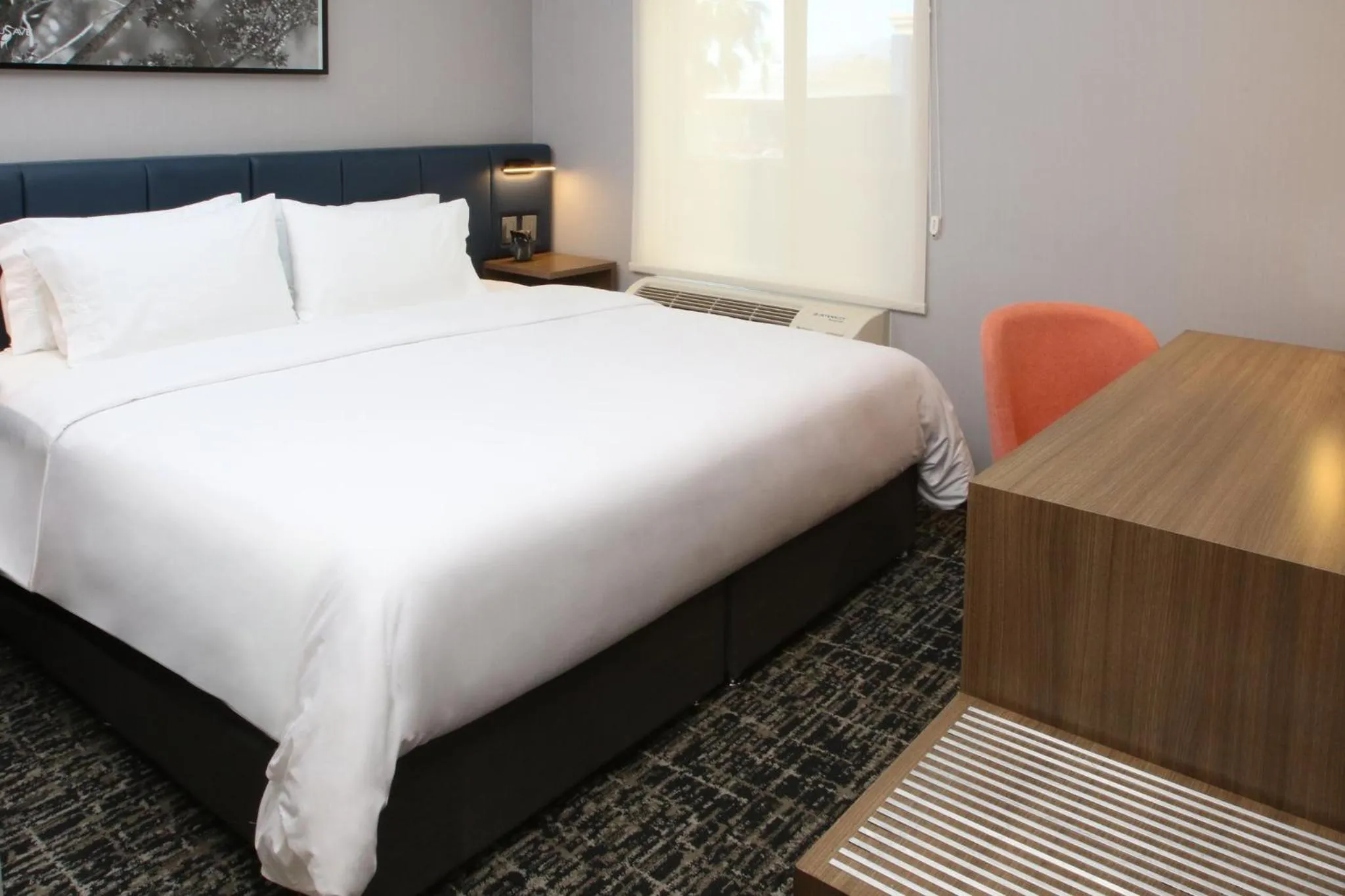 Photo of the whole room, Bed in voco Saltillo Suites by IHG