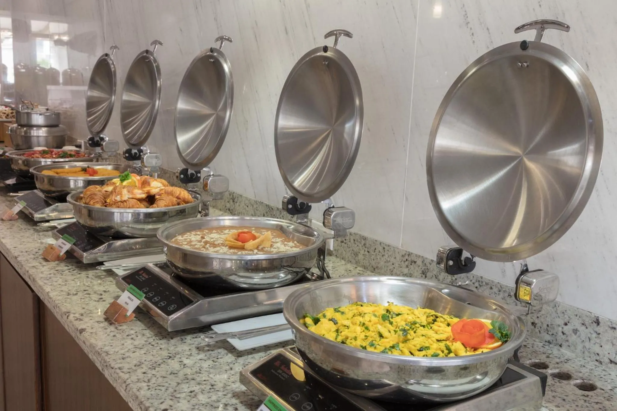 Breakfast in voco Saltillo Suites by IHG