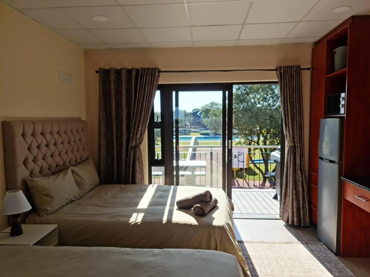 Photo of the whole room, Bed in Lethabong Lodge