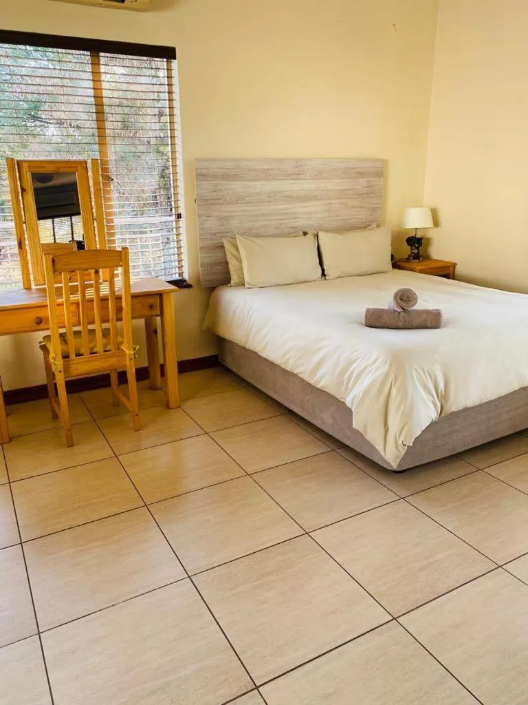 Bed in Lethabong Lodge