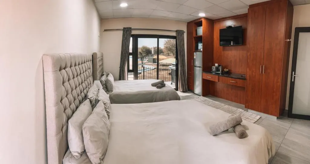 Bed in Lethabong Lodge