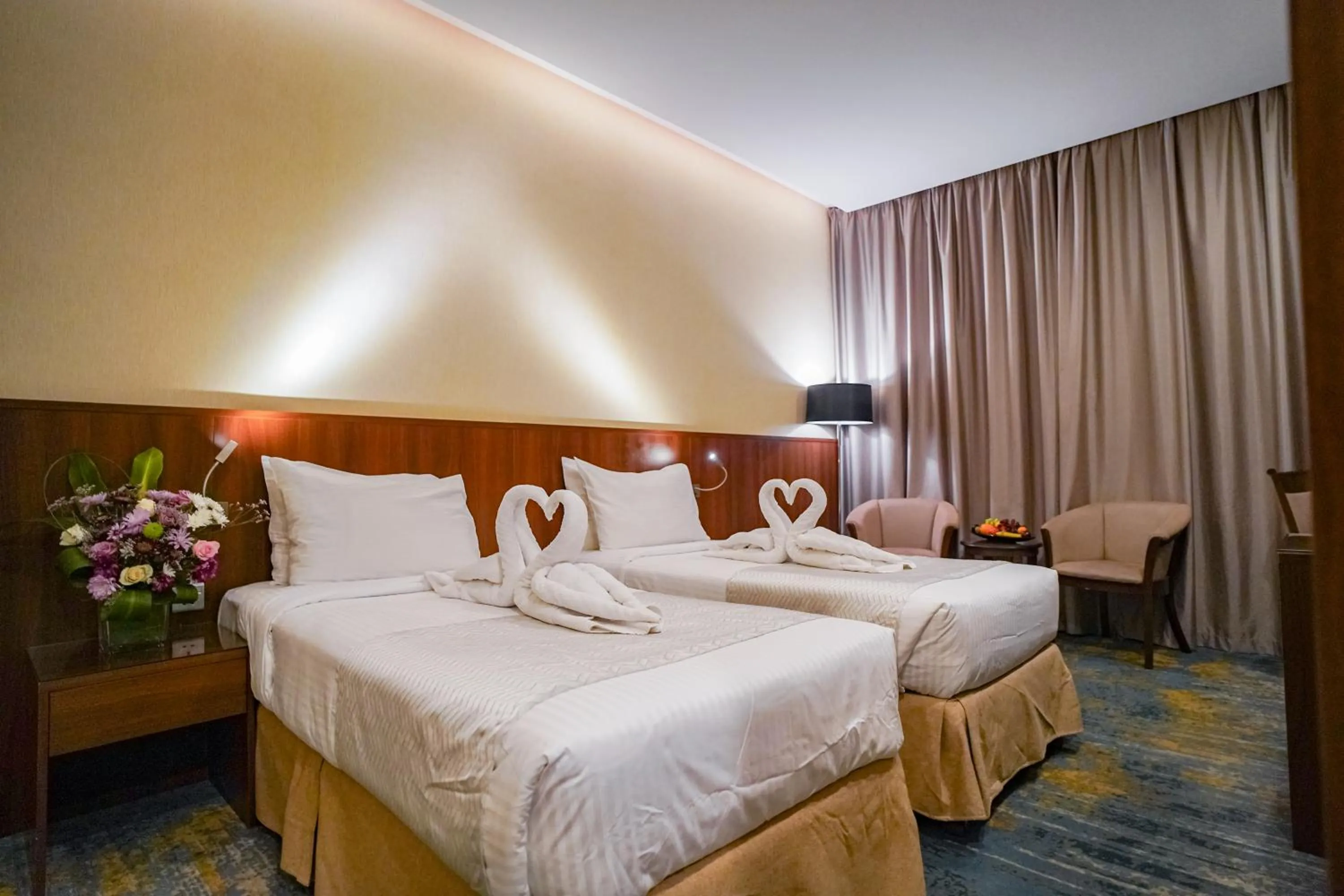 Bed in Emaar Elite Hotel