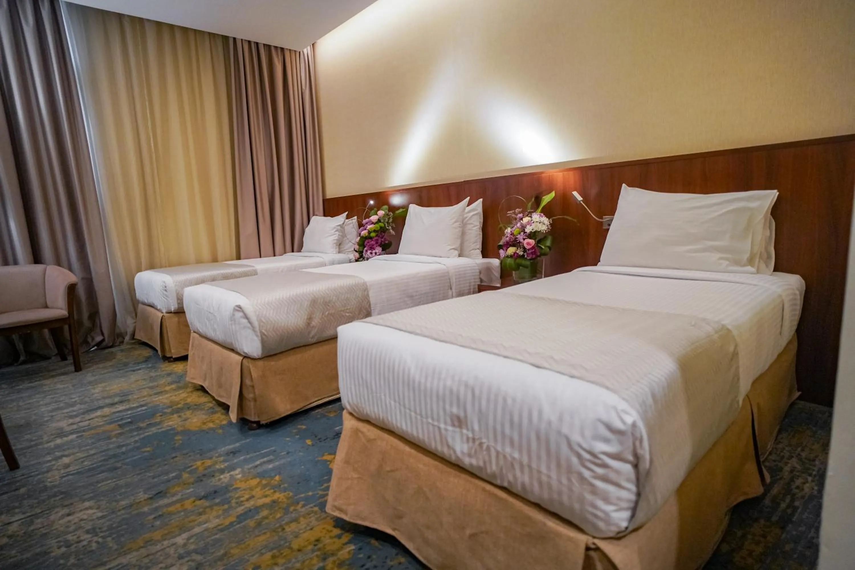 Bed in Emaar Elite Hotel