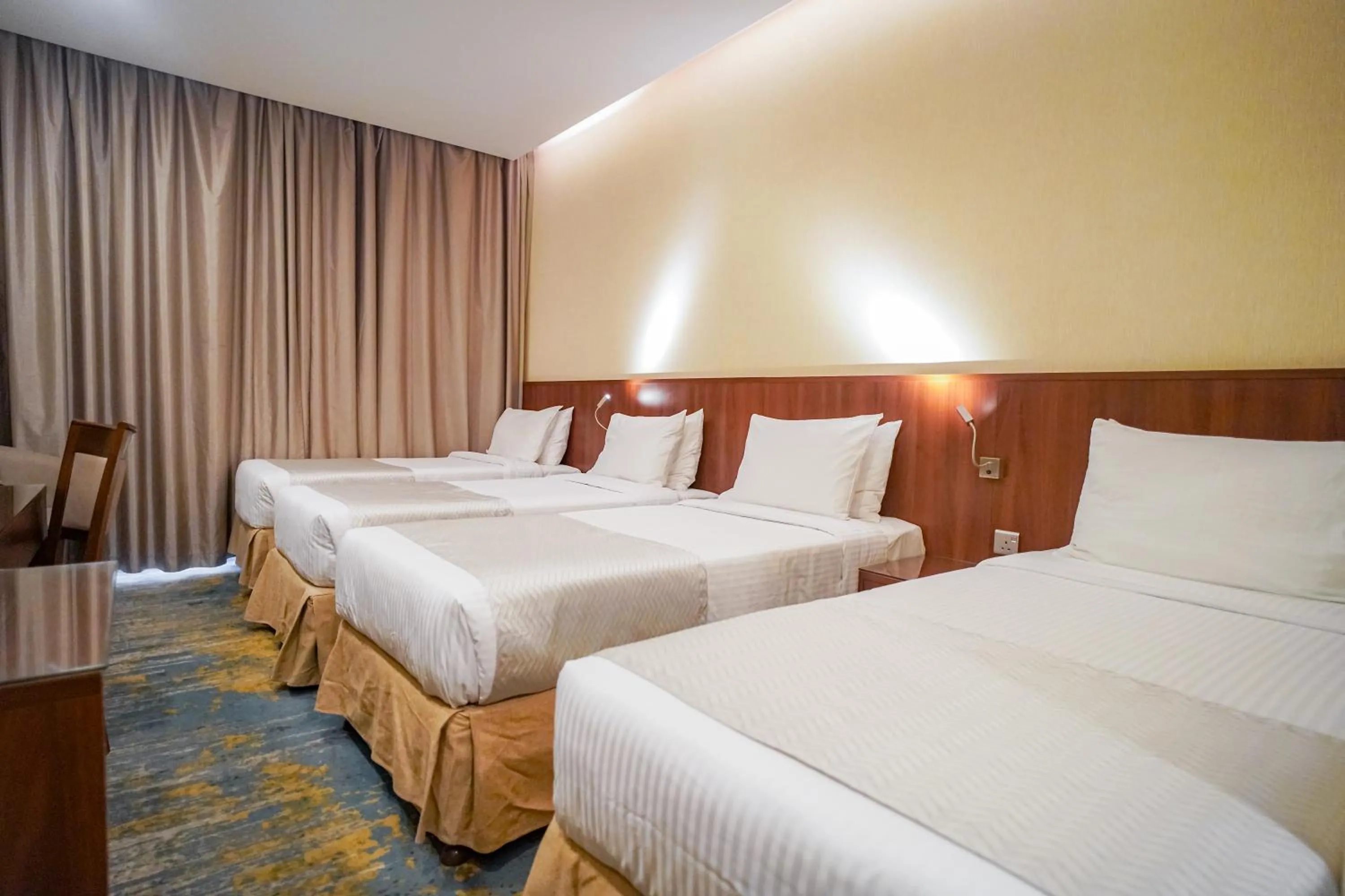 Bed in Emaar Elite Hotel