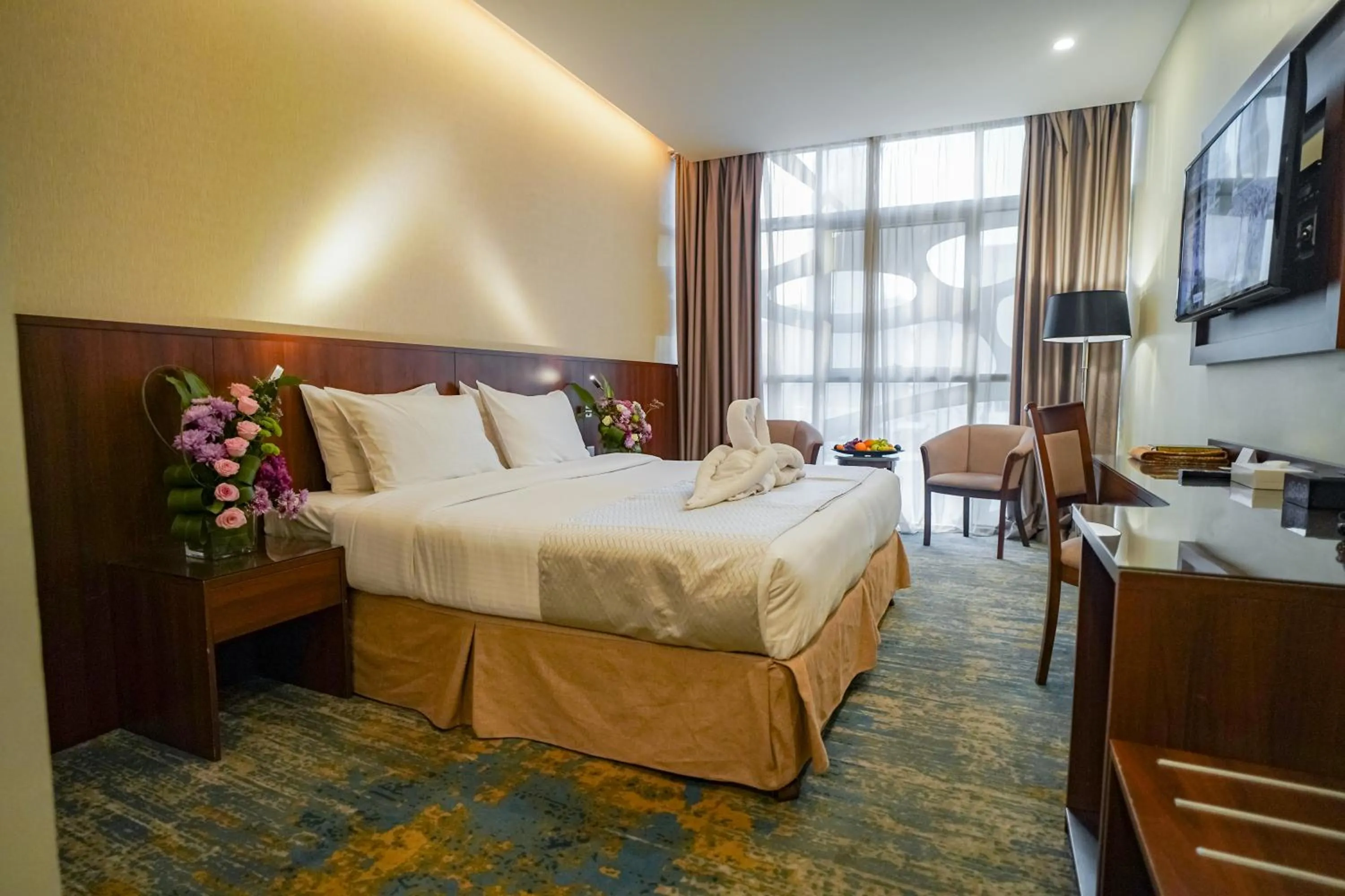 Bed in Emaar Elite Hotel