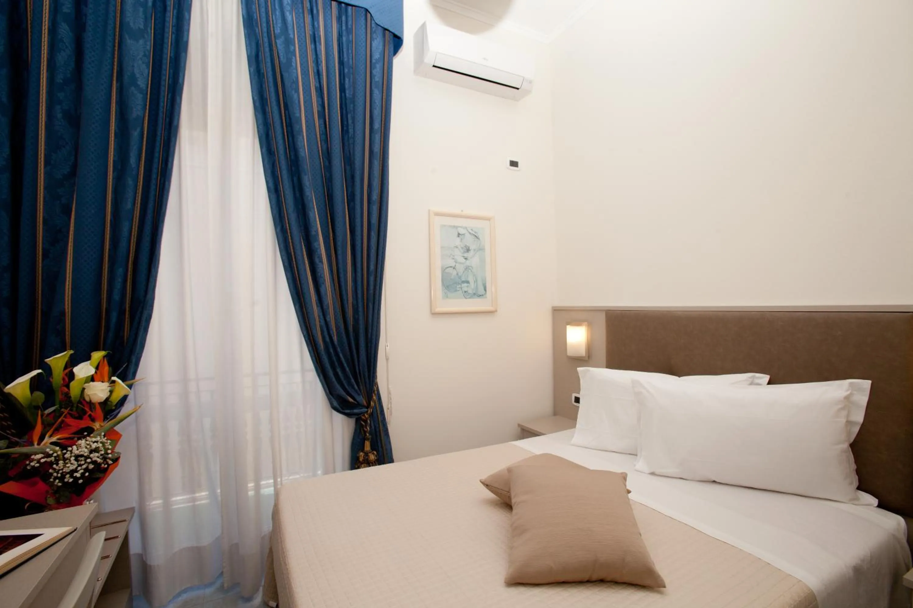 Bed in Hotel Giulio Cesare