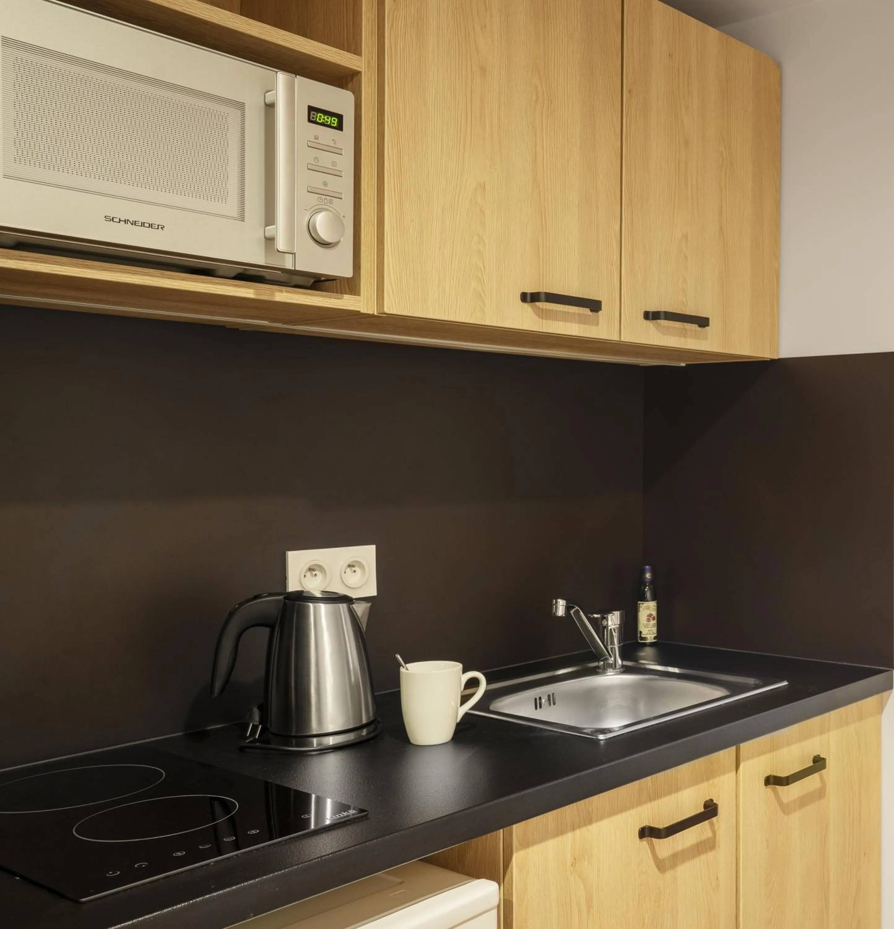 Kitchen or kitchenette in Residhome Sénart