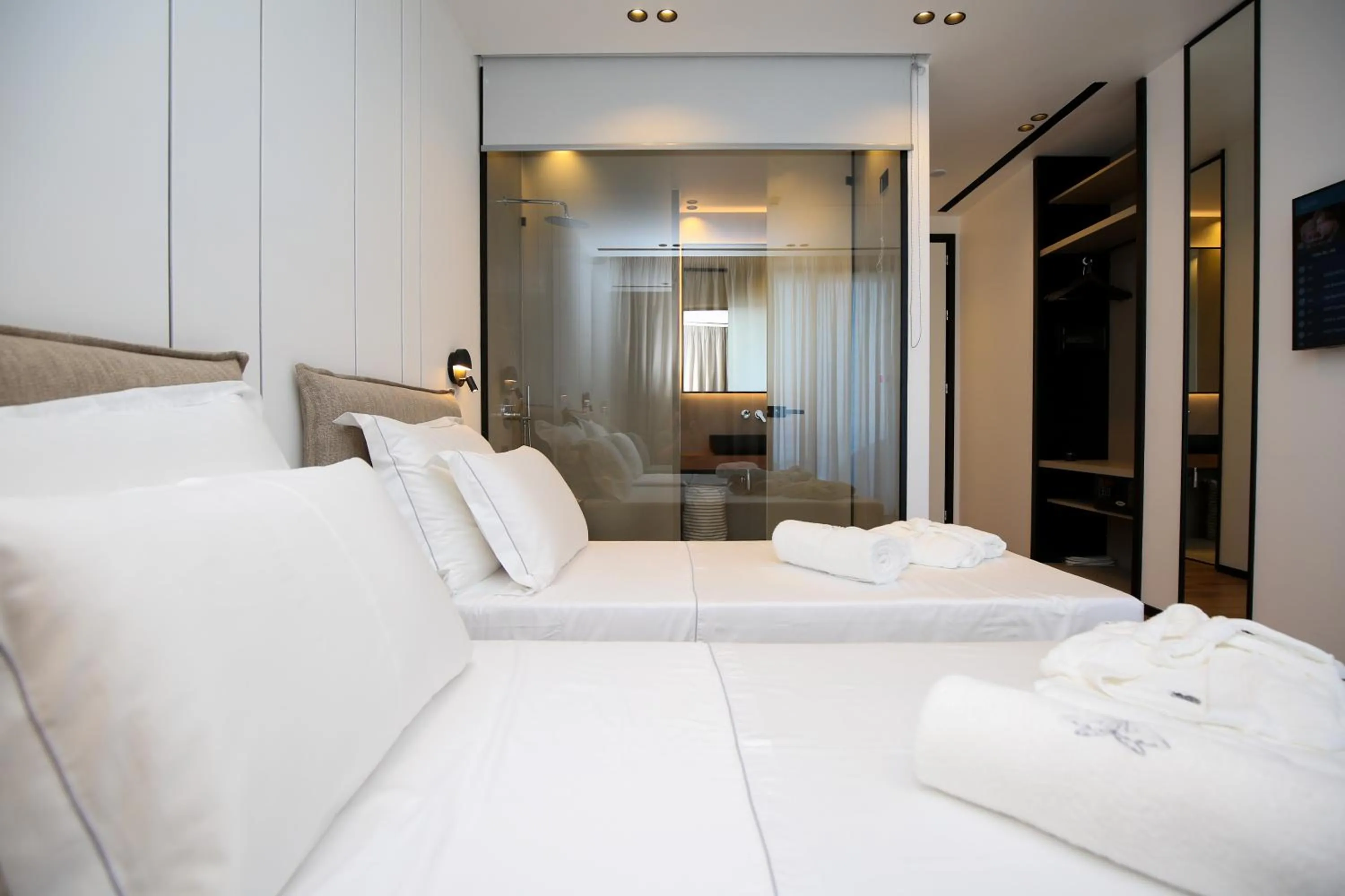 Bed in Nobus Hotel & Spa