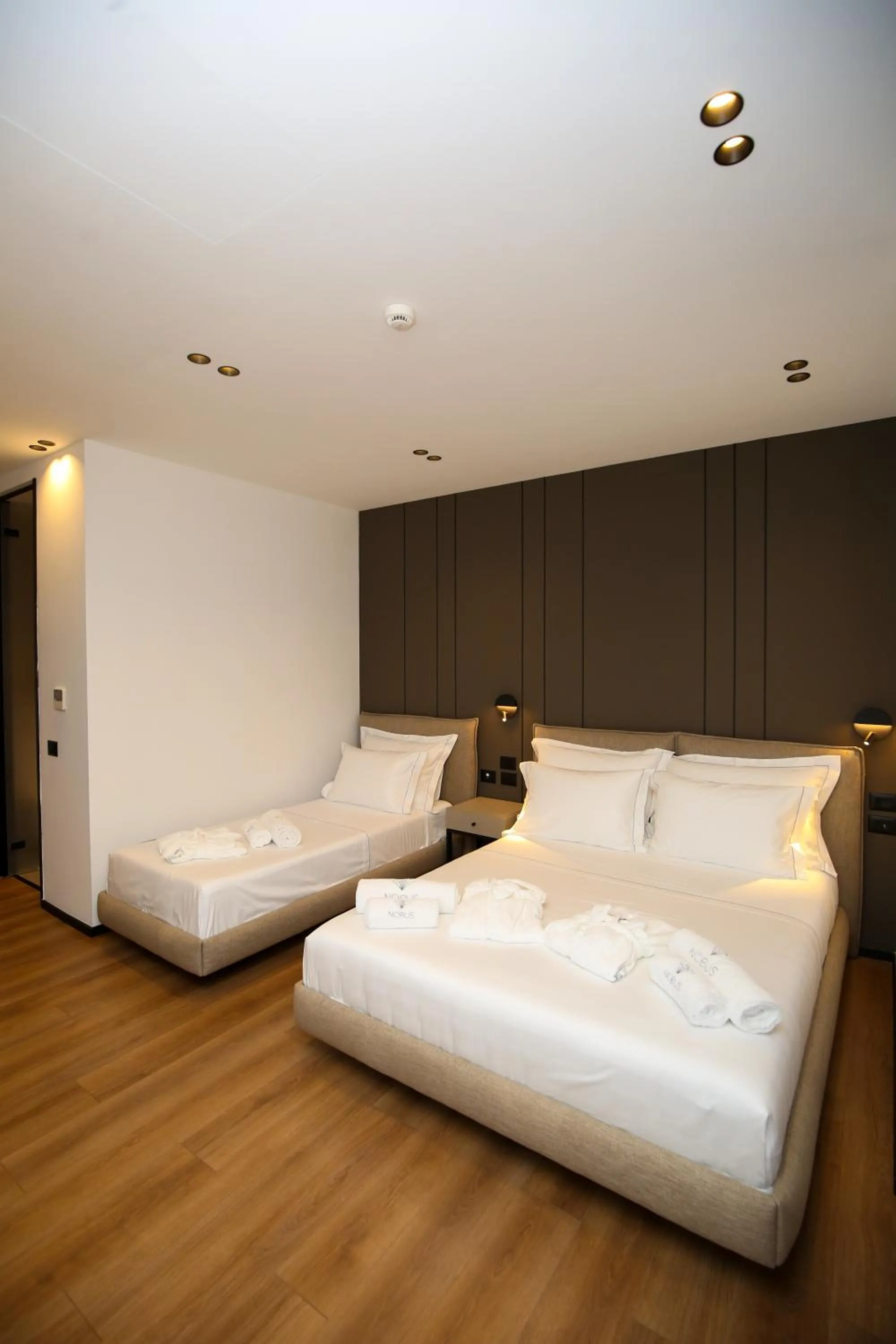 Bed in Nobus Hotel & Spa