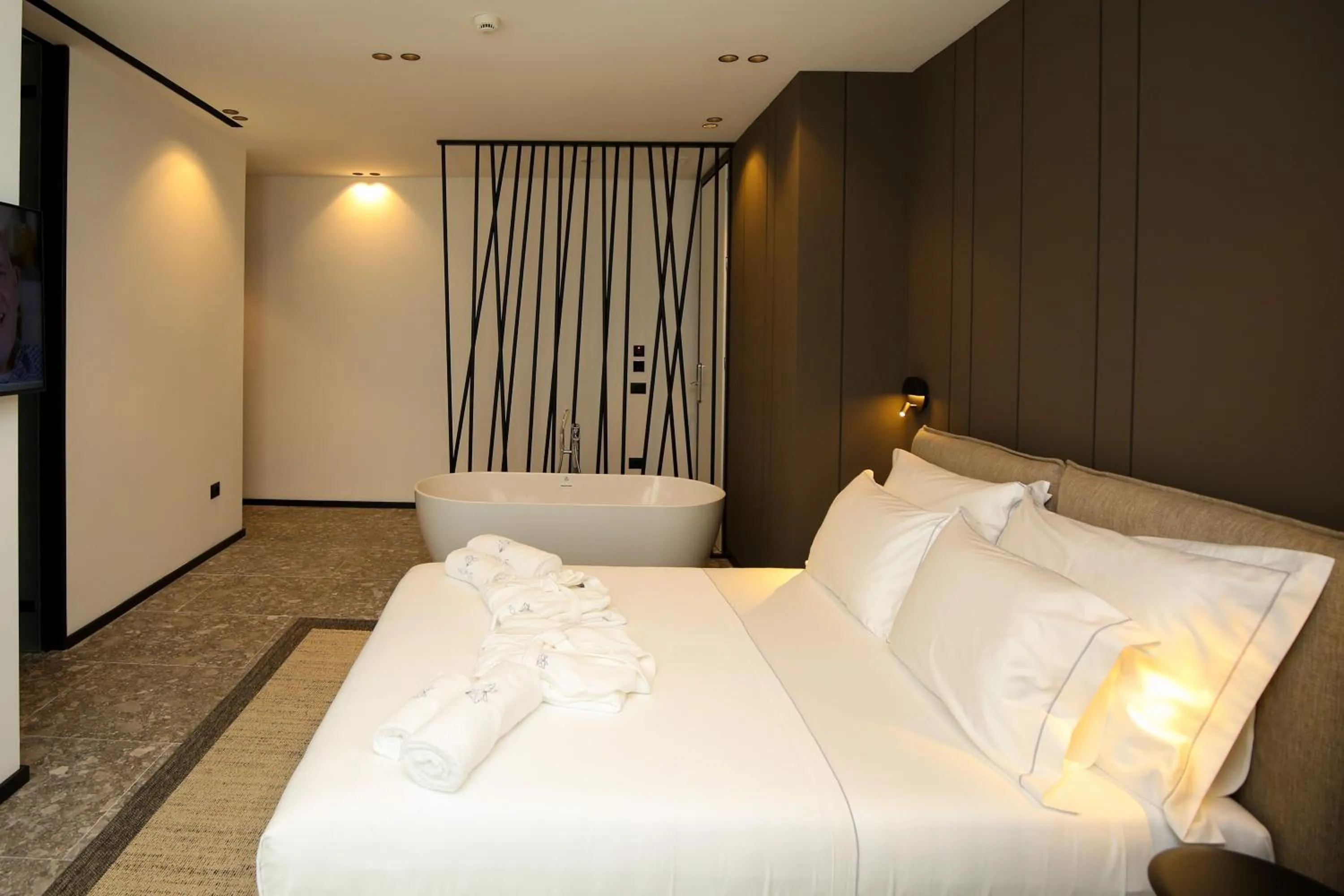 Bed in Nobus Hotel & Spa