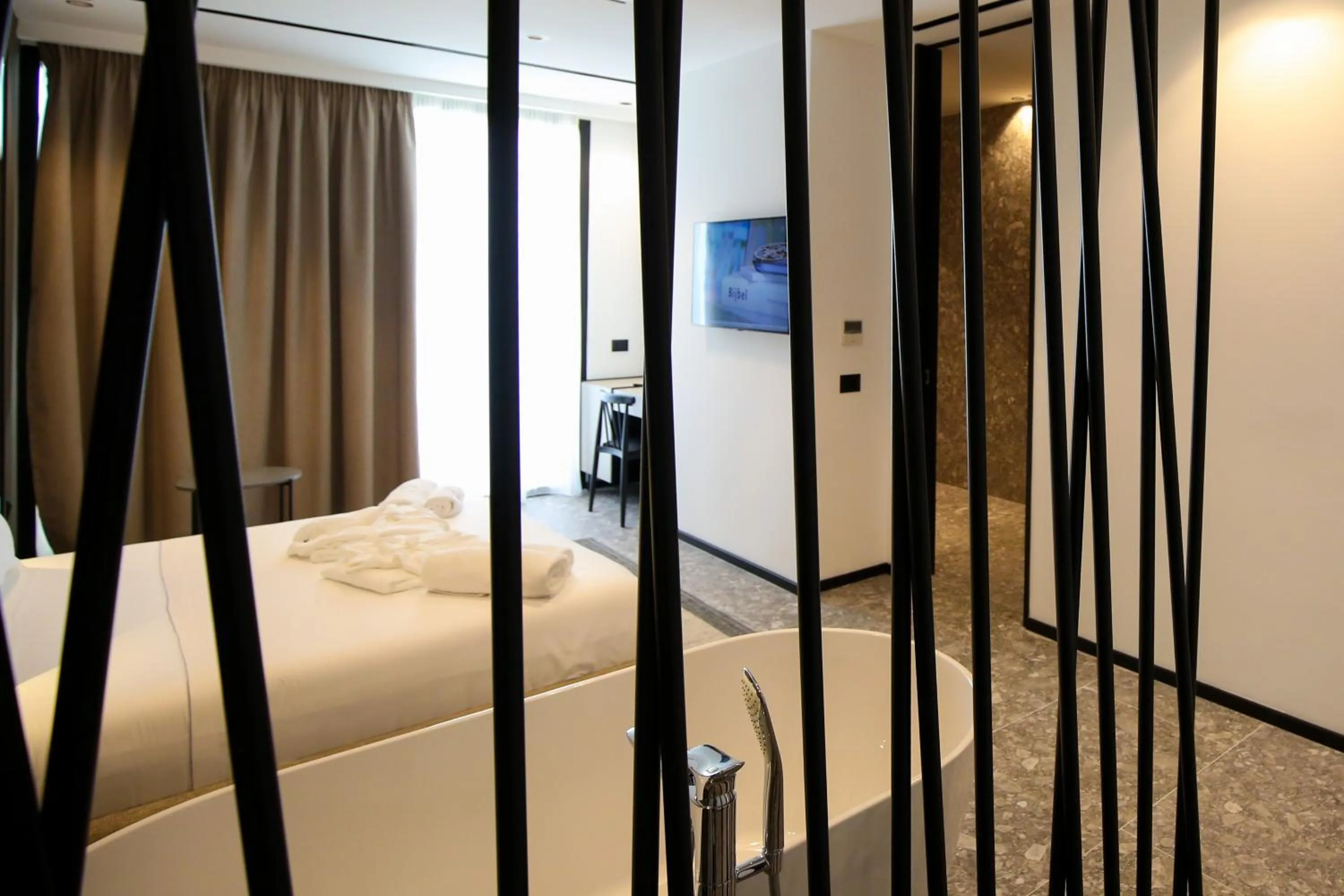 Bed in Nobus Hotel & Spa