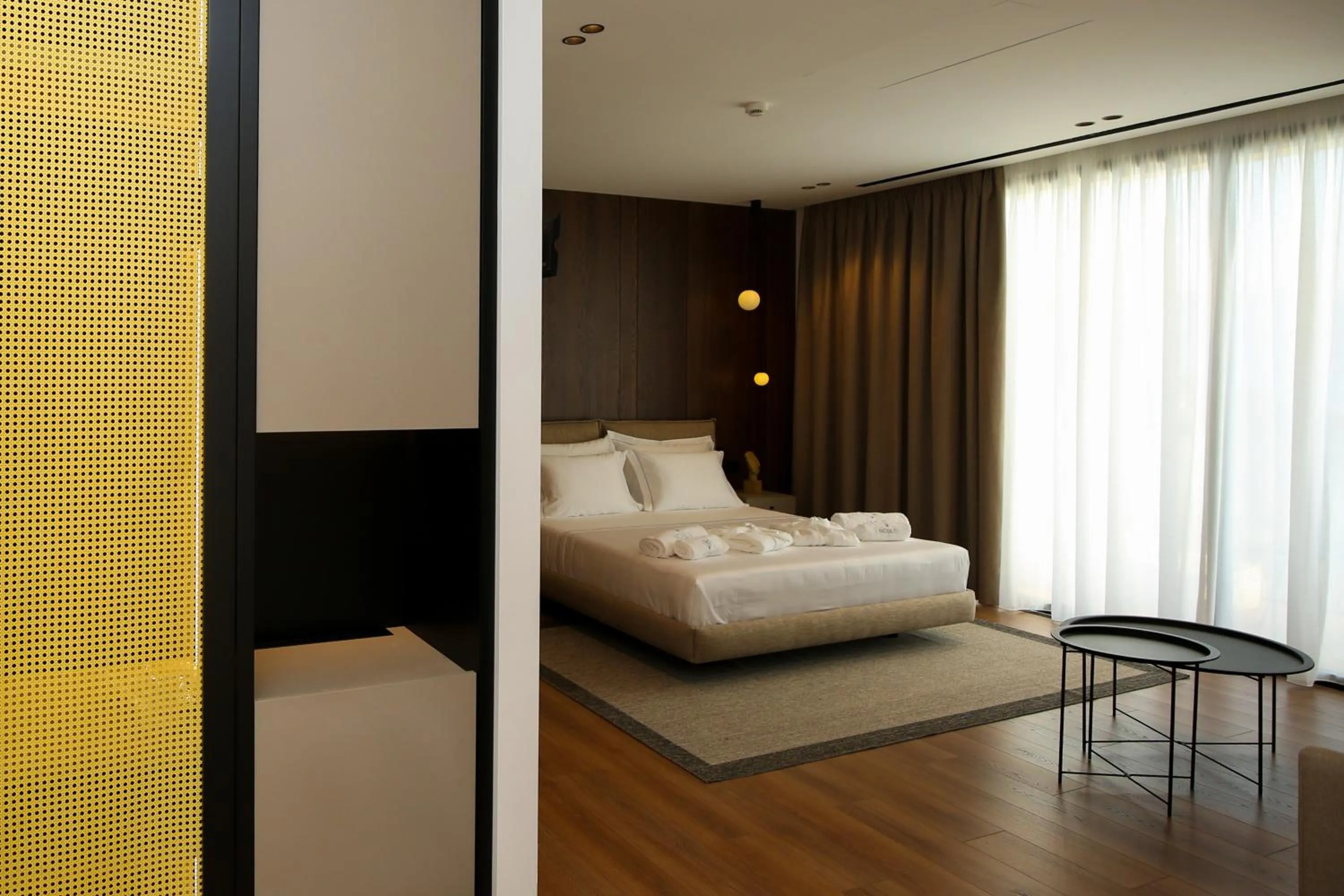 Bed in Nobus Hotel & Spa