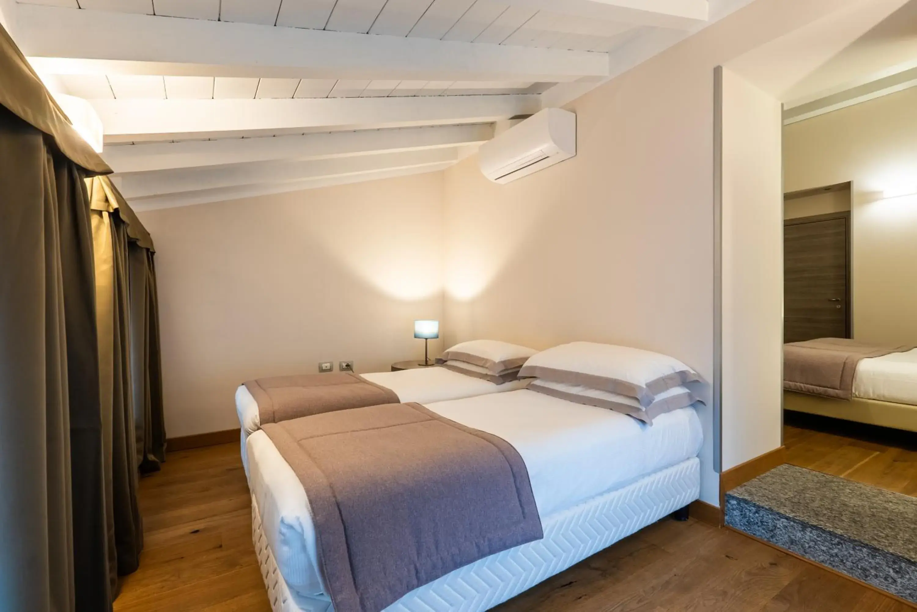 Deluxe Quadruple Room in Hotel Centrale Deluxe Quadruple Room in Hotel Centrale