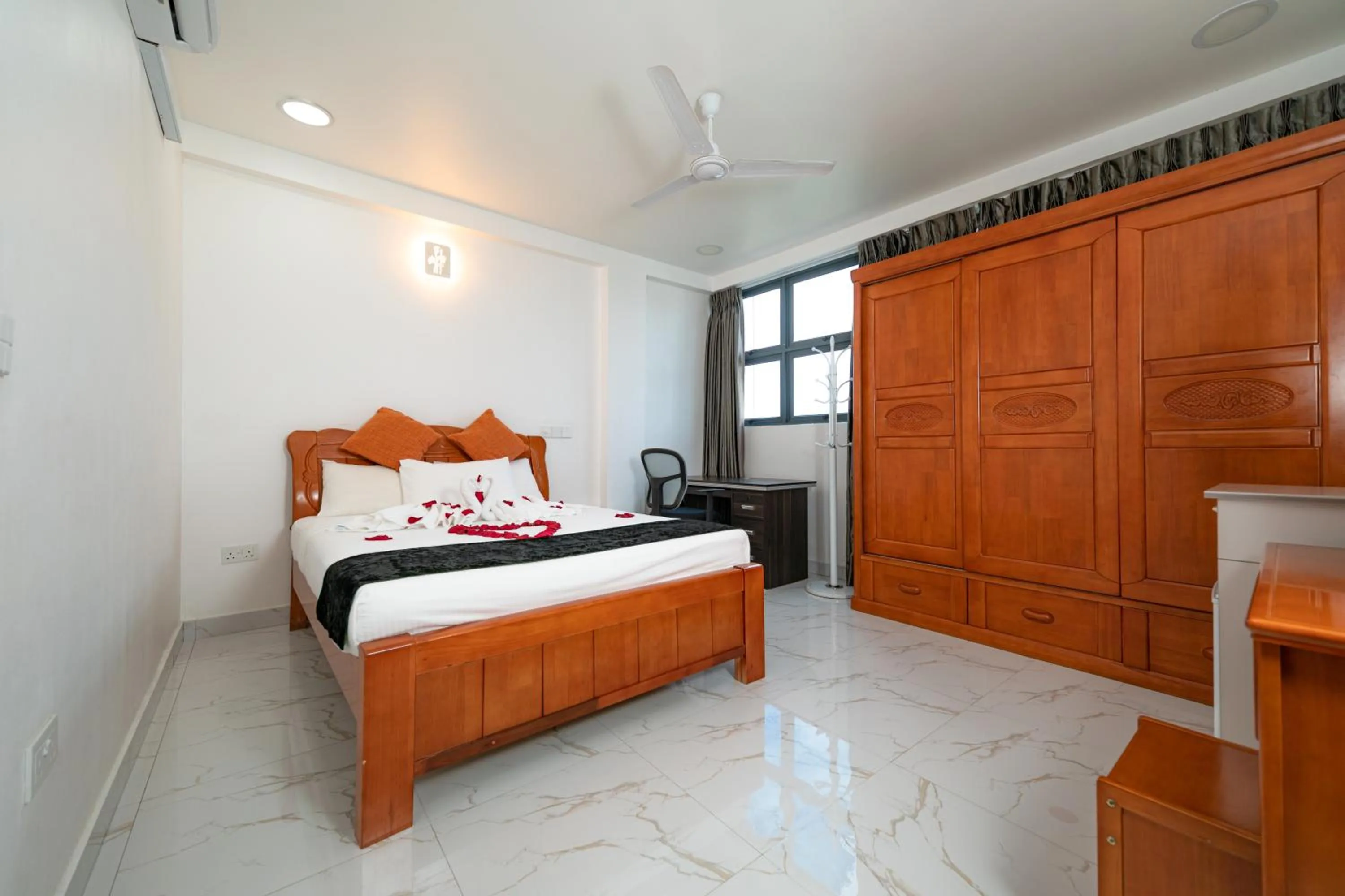 Photo of the whole room, Bed in White Beach Holiday at Hulhumale'