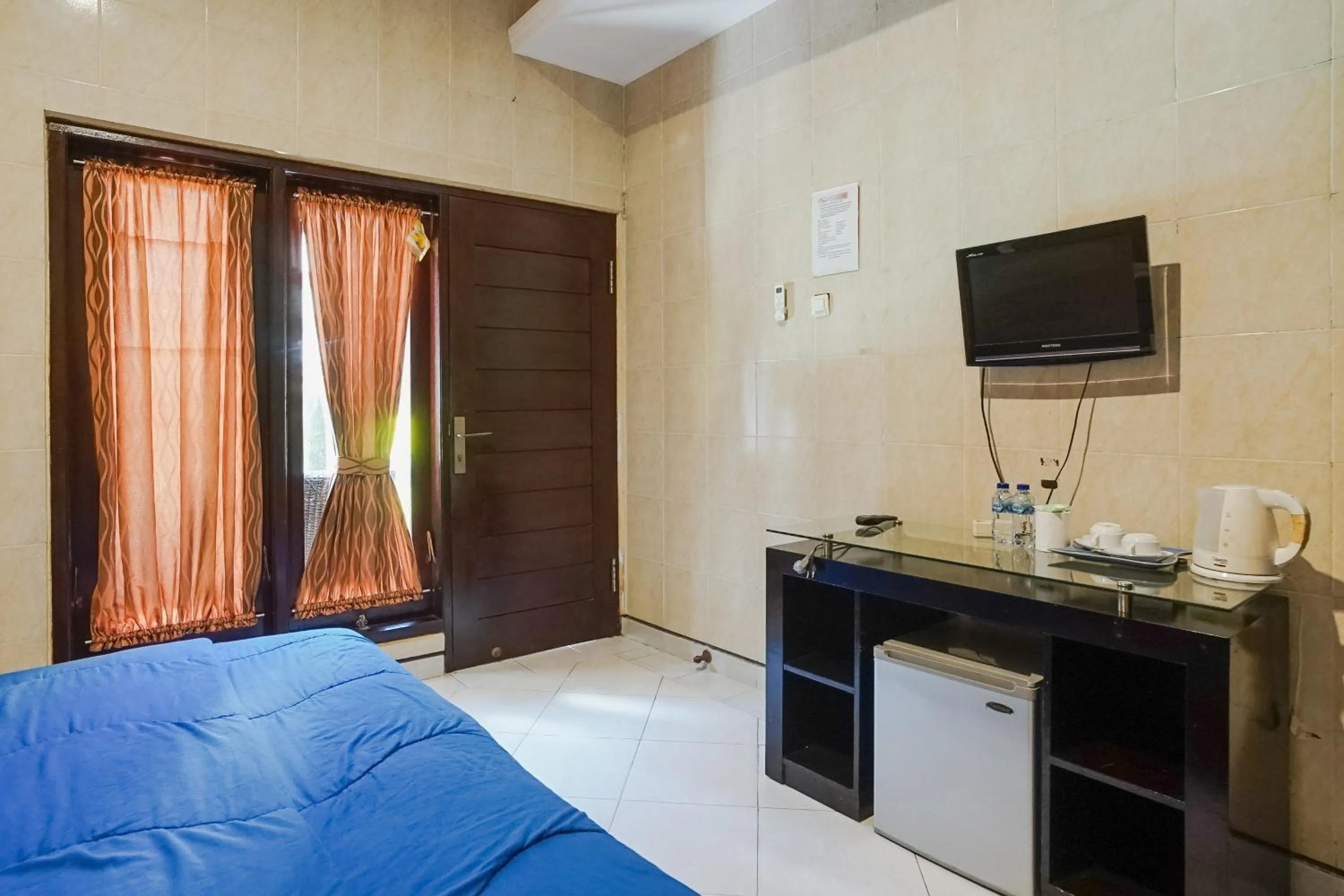 Bed in DENAYS GUESTHOUSE JIMBARAN