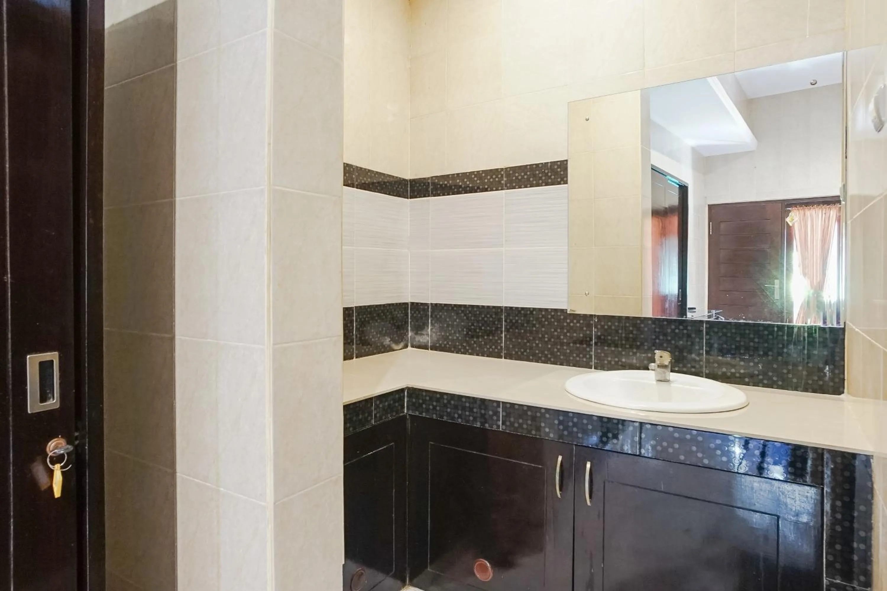 Bathroom in DENAYS GUESTHOUSE JIMBARAN