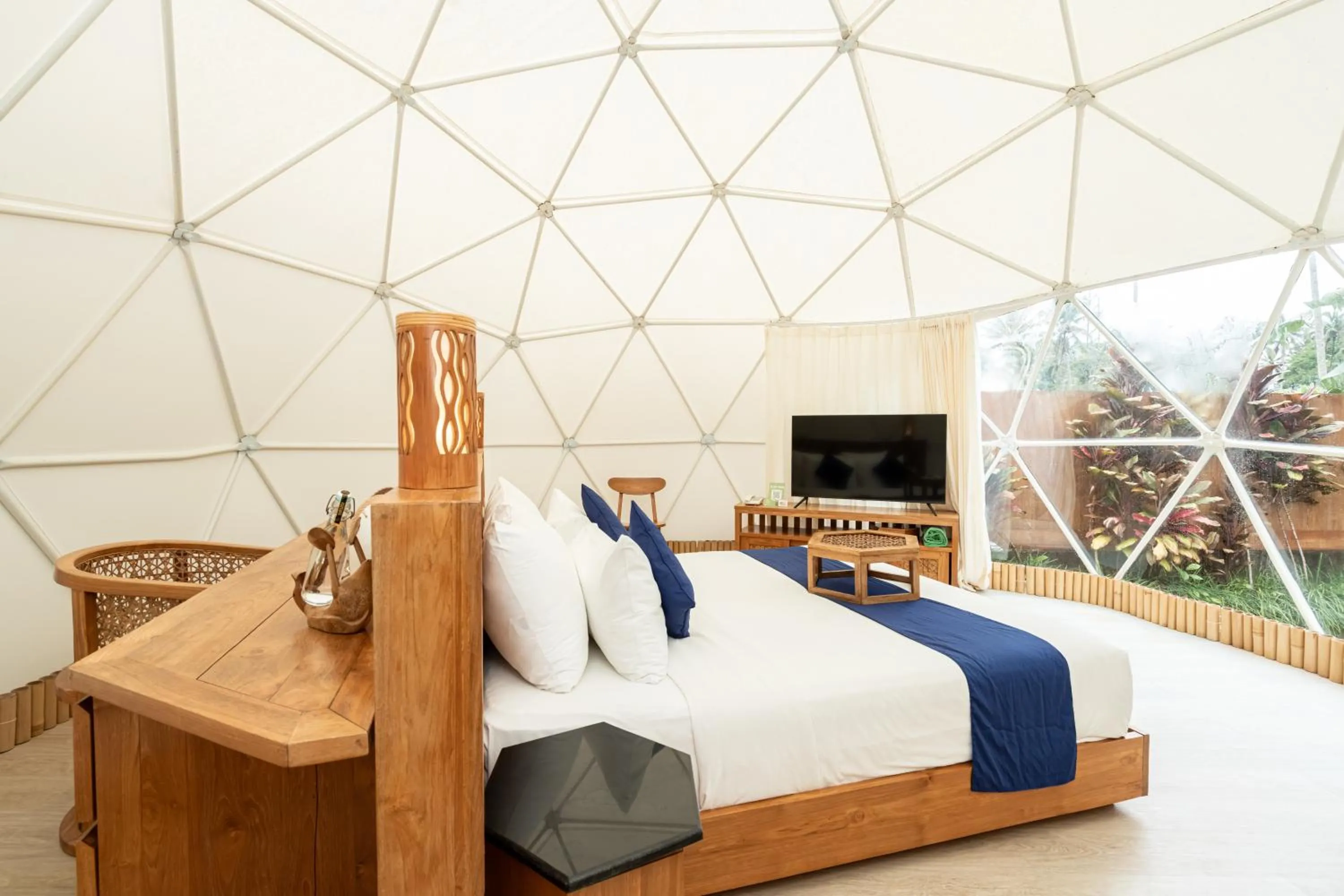 Bed in Triyana Resort and Glamping Carangsari