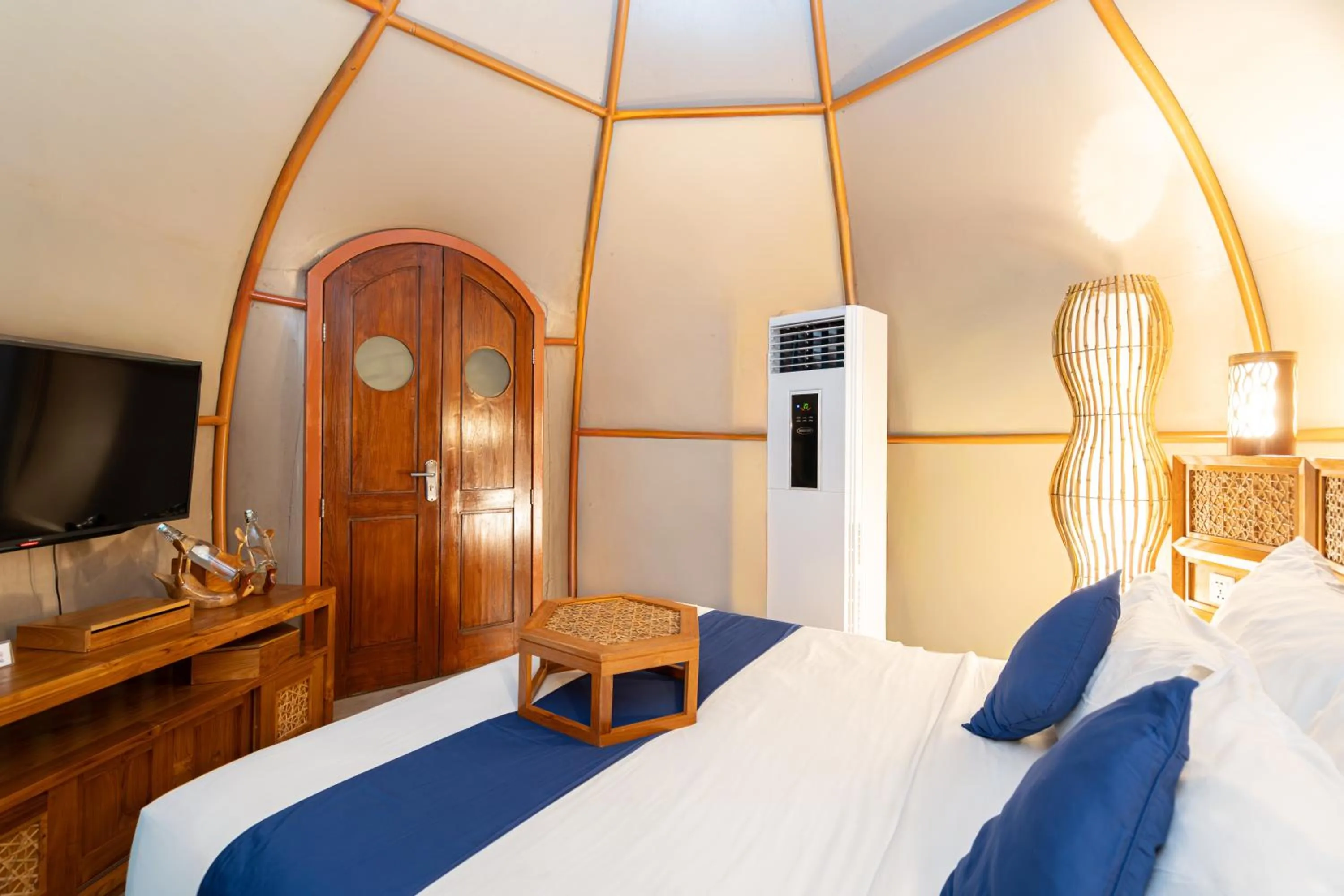 Bed in Triyana Resort and Glamping Carangsari