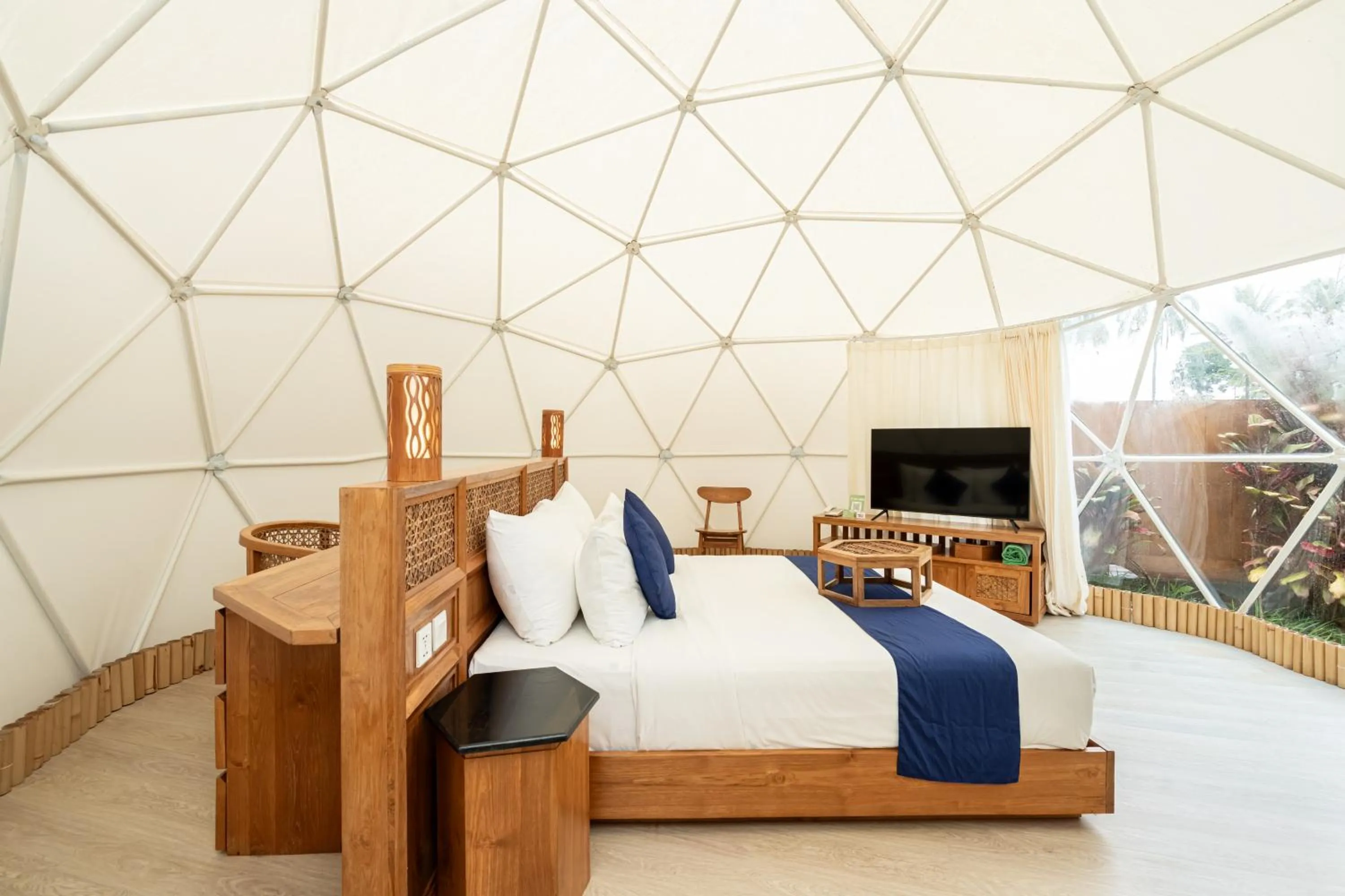 Bed in Triyana Resort and Glamping Carangsari