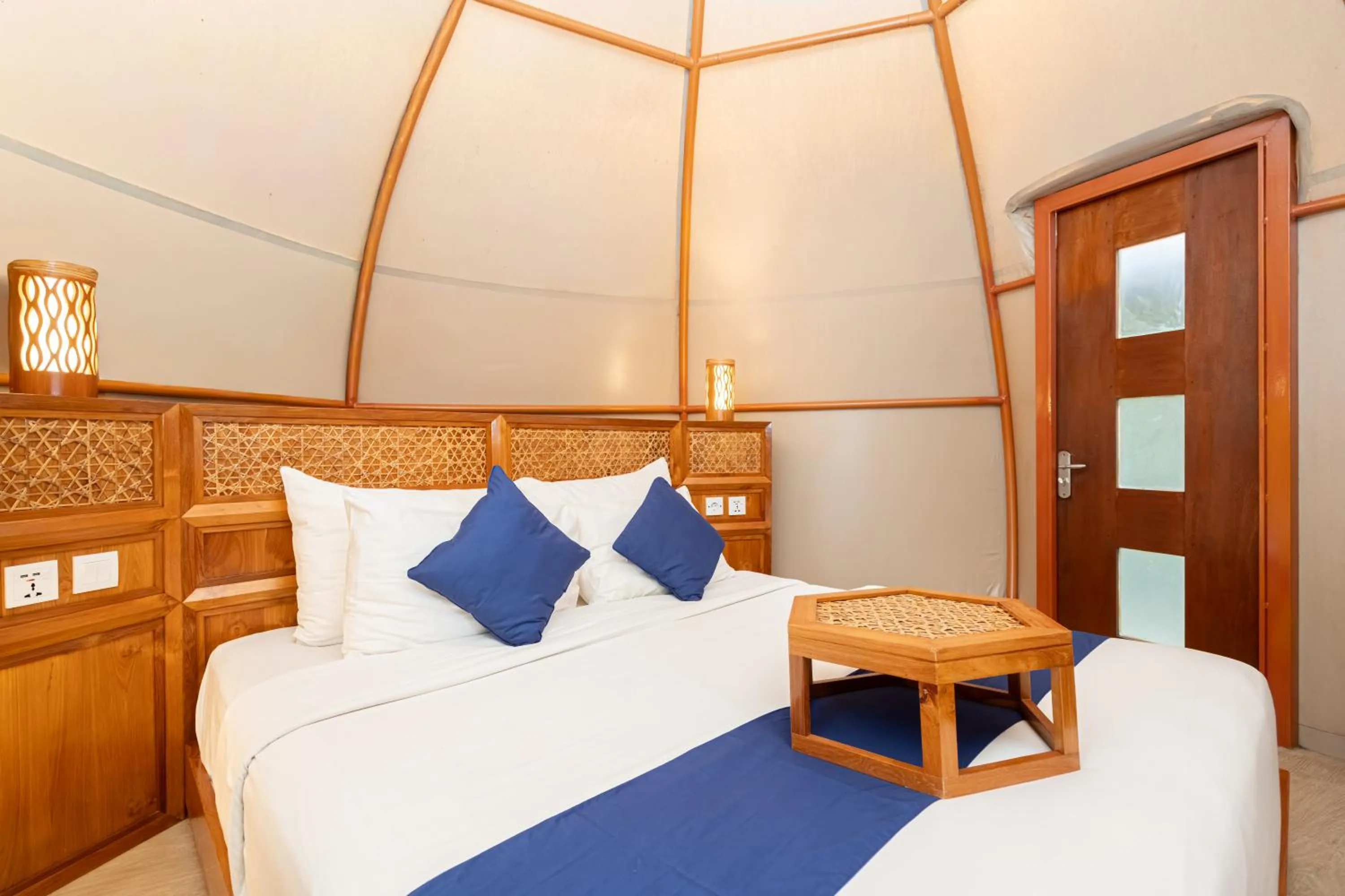 Bed in Triyana Resort and Glamping Carangsari
