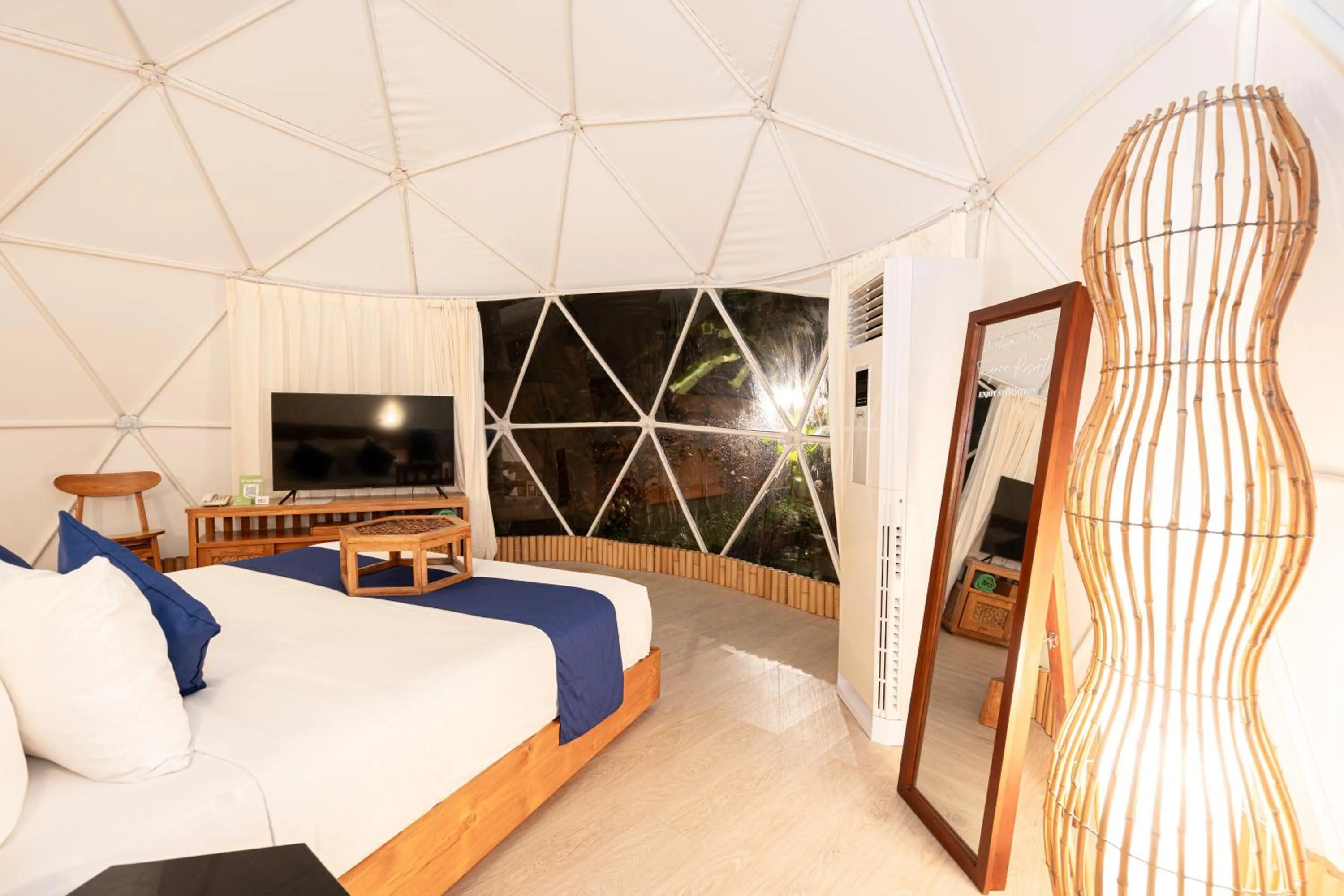 Bed in Triyana Resort and Glamping Carangsari