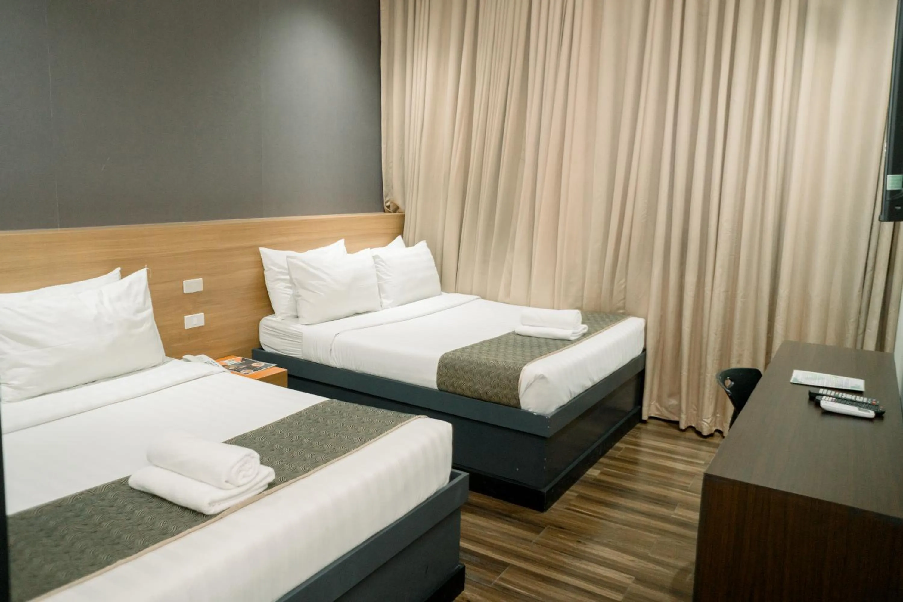 Bed in Greenwindows Hotel