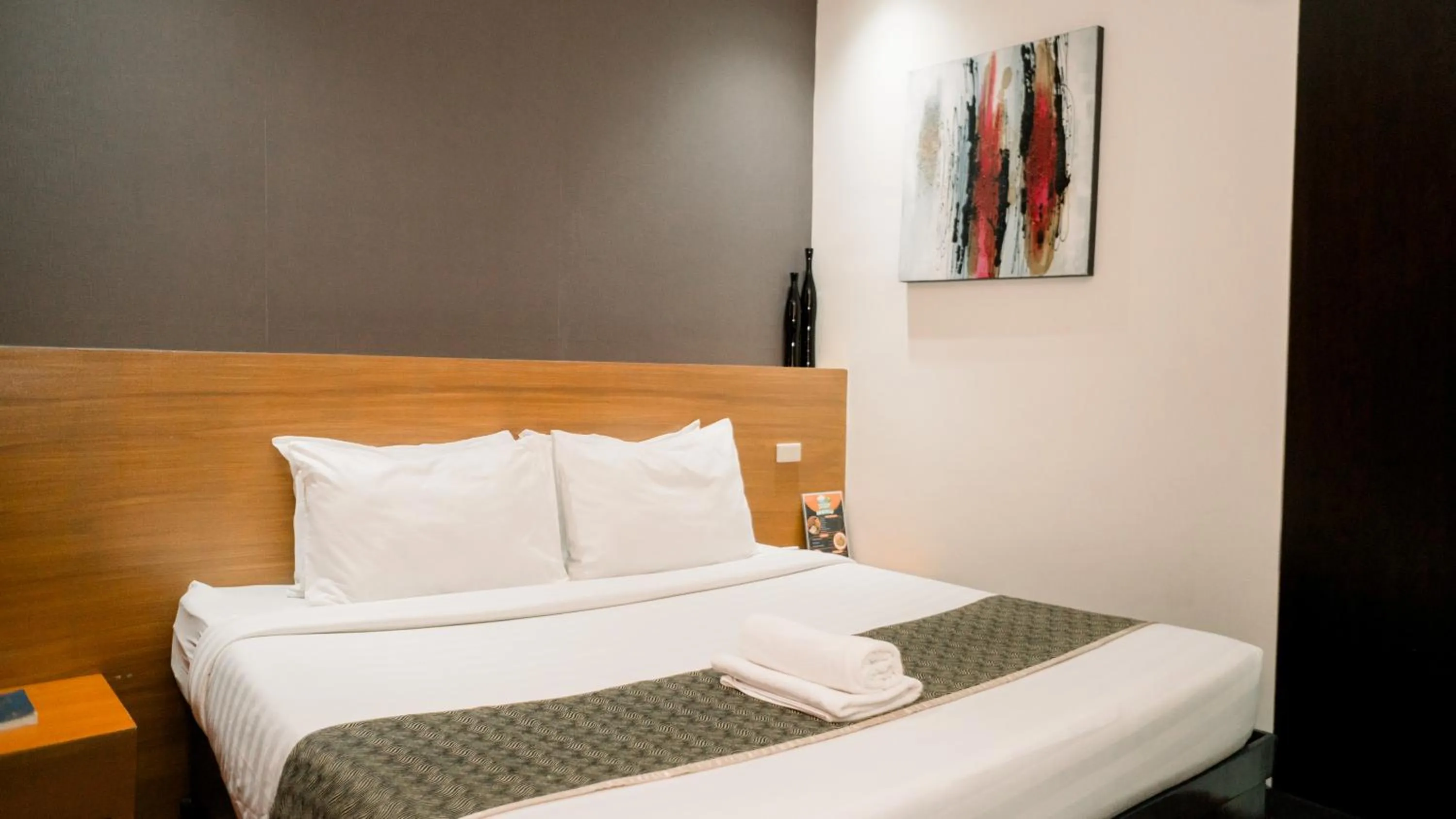 Bed in Greenwindows Hotel