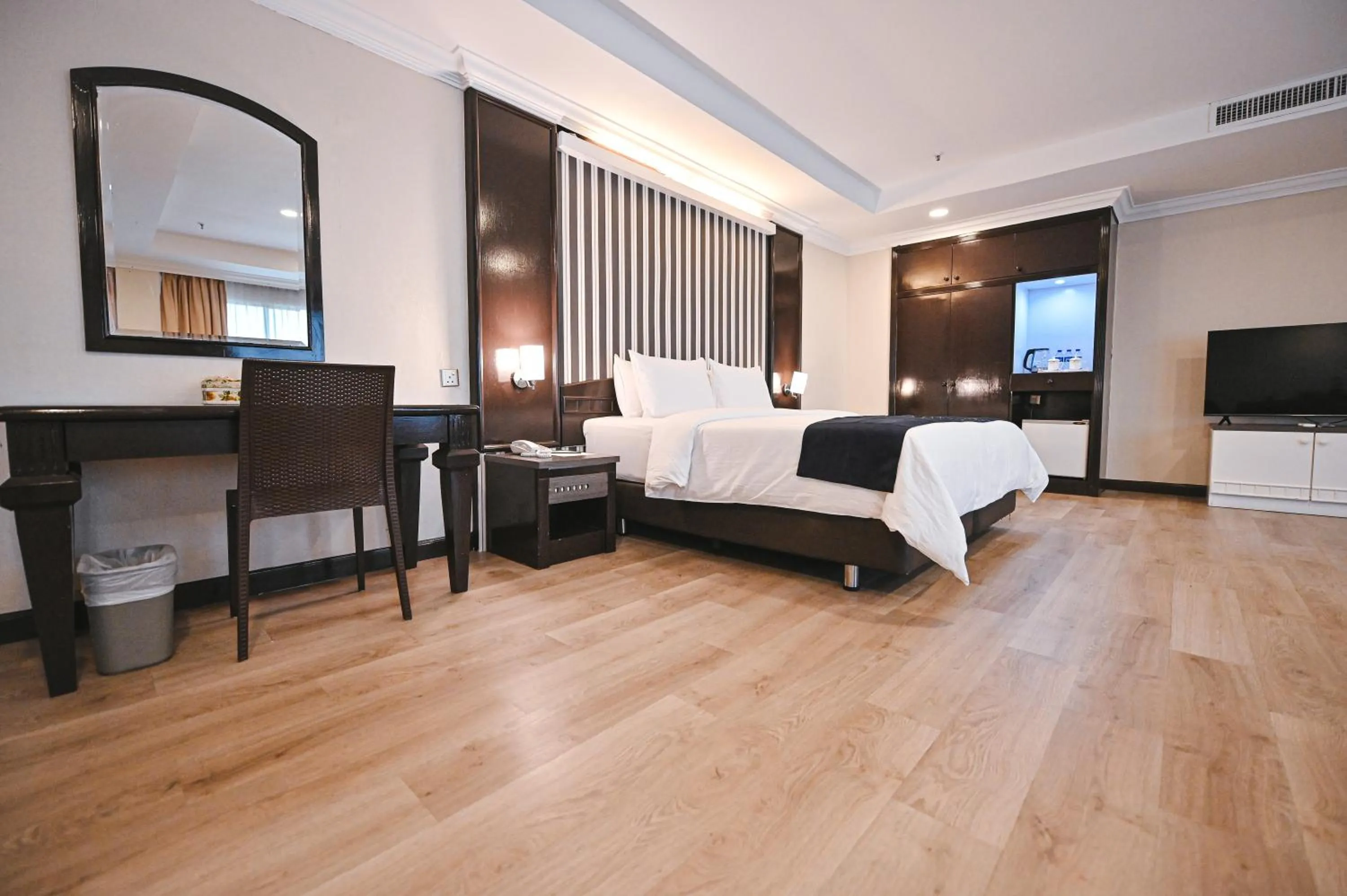 Bed in PRIME CITY HOTEL KLUANG