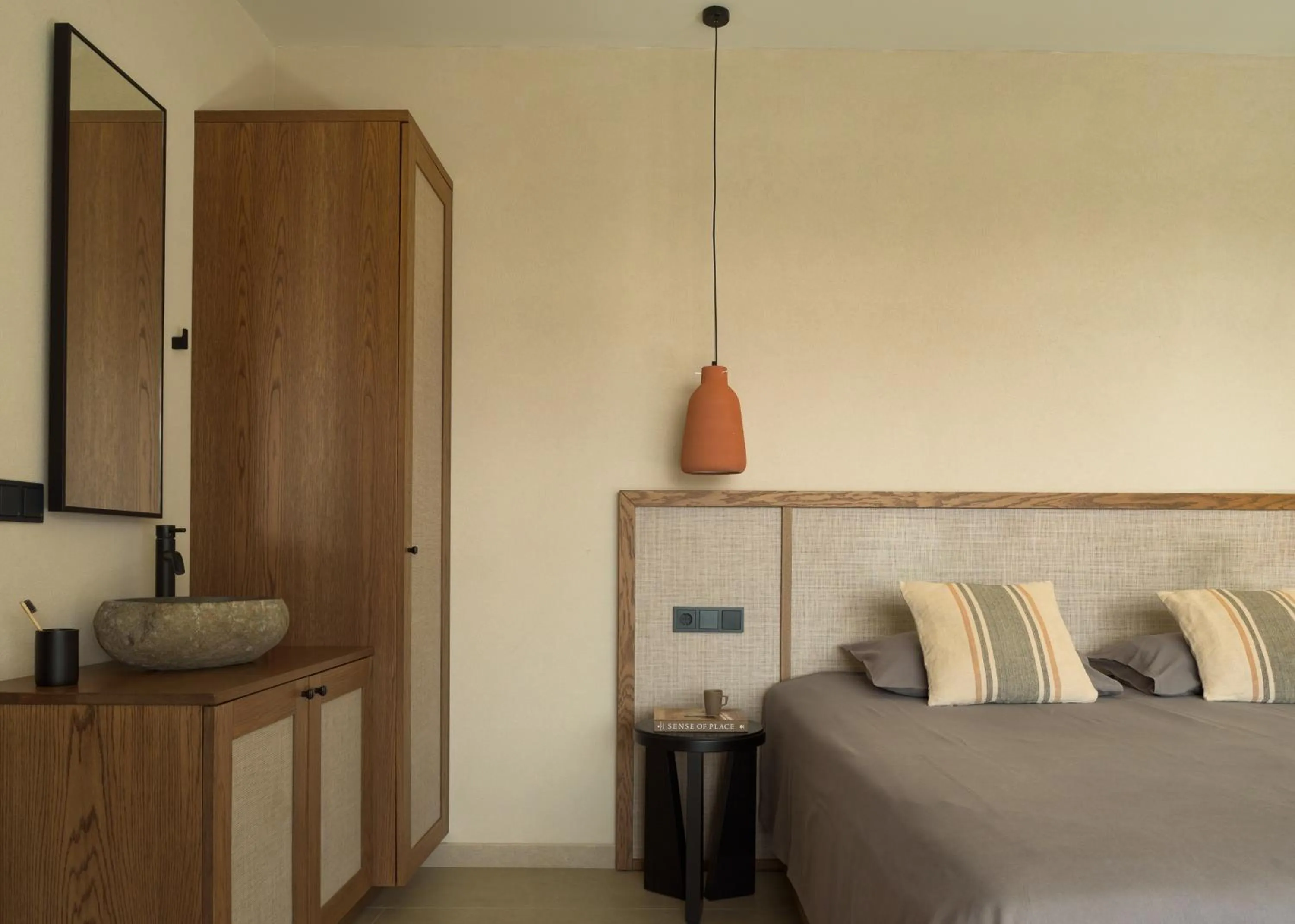 Bed in KYMANI Boutique Hotel & Suites