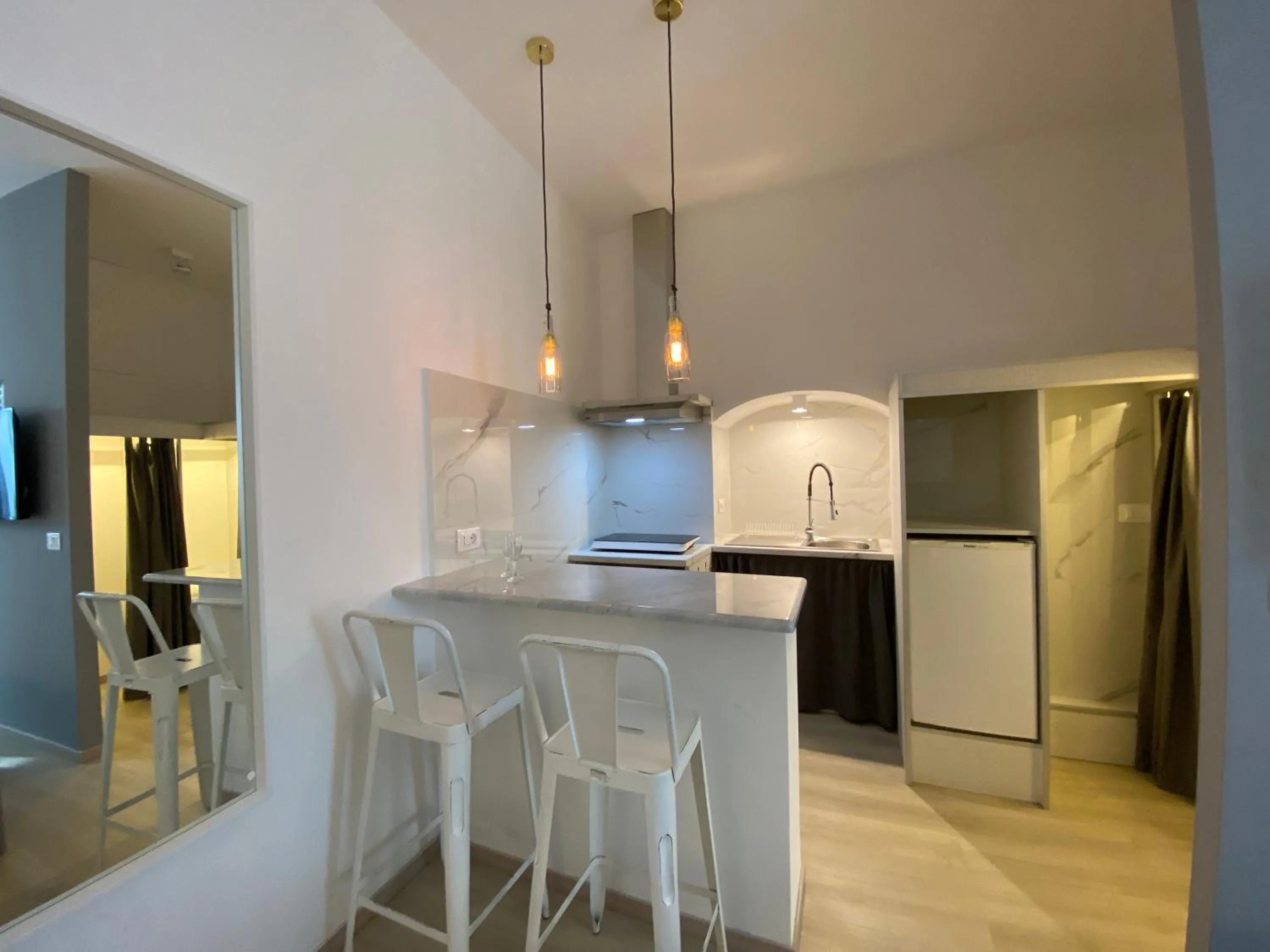 Kitchen or kitchenette in Residenze Romano Ristorante & Spa - albergo diffuso - RED