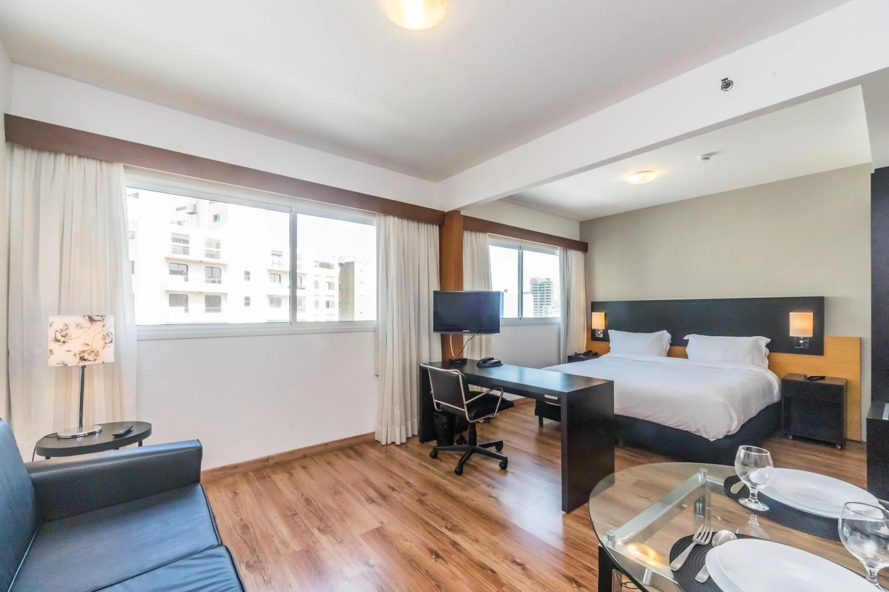 Bed in Paraíso Suítes by Charlie