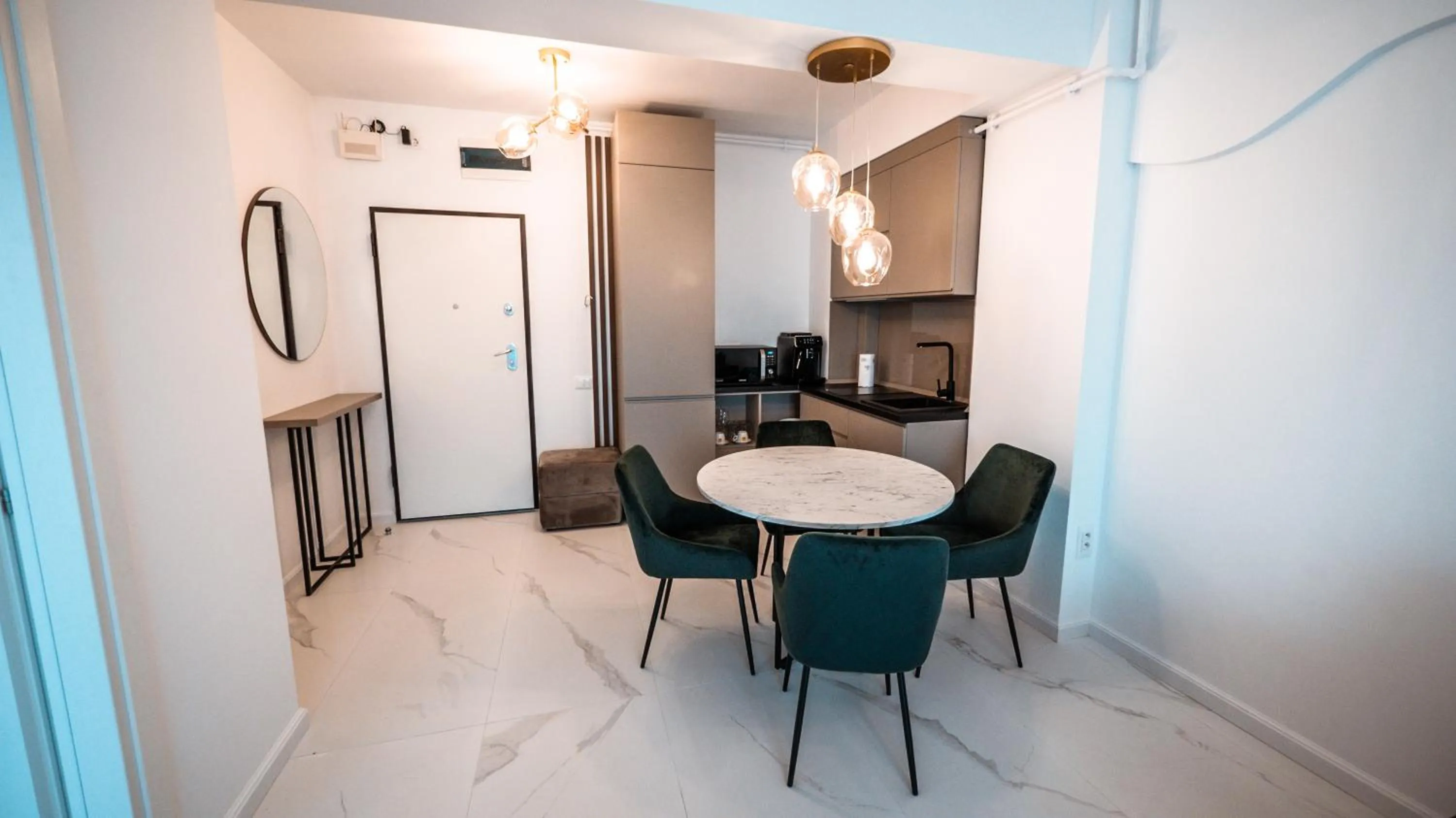 Dining area in WAVE 4 Apartments Mamaia Nord