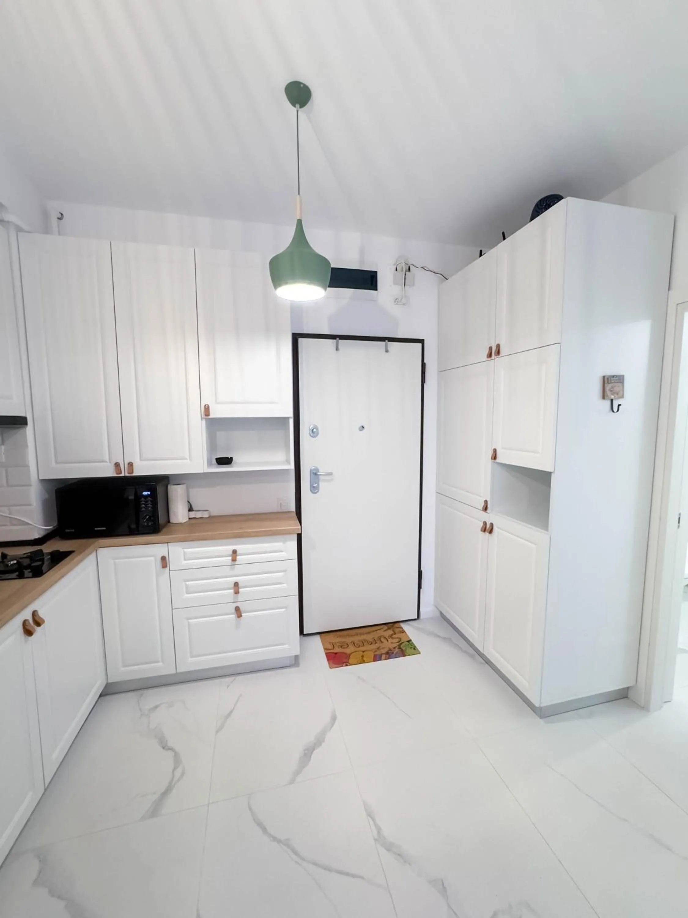 Kitchen or kitchenette in WAVE 4 Apartments Mamaia Nord