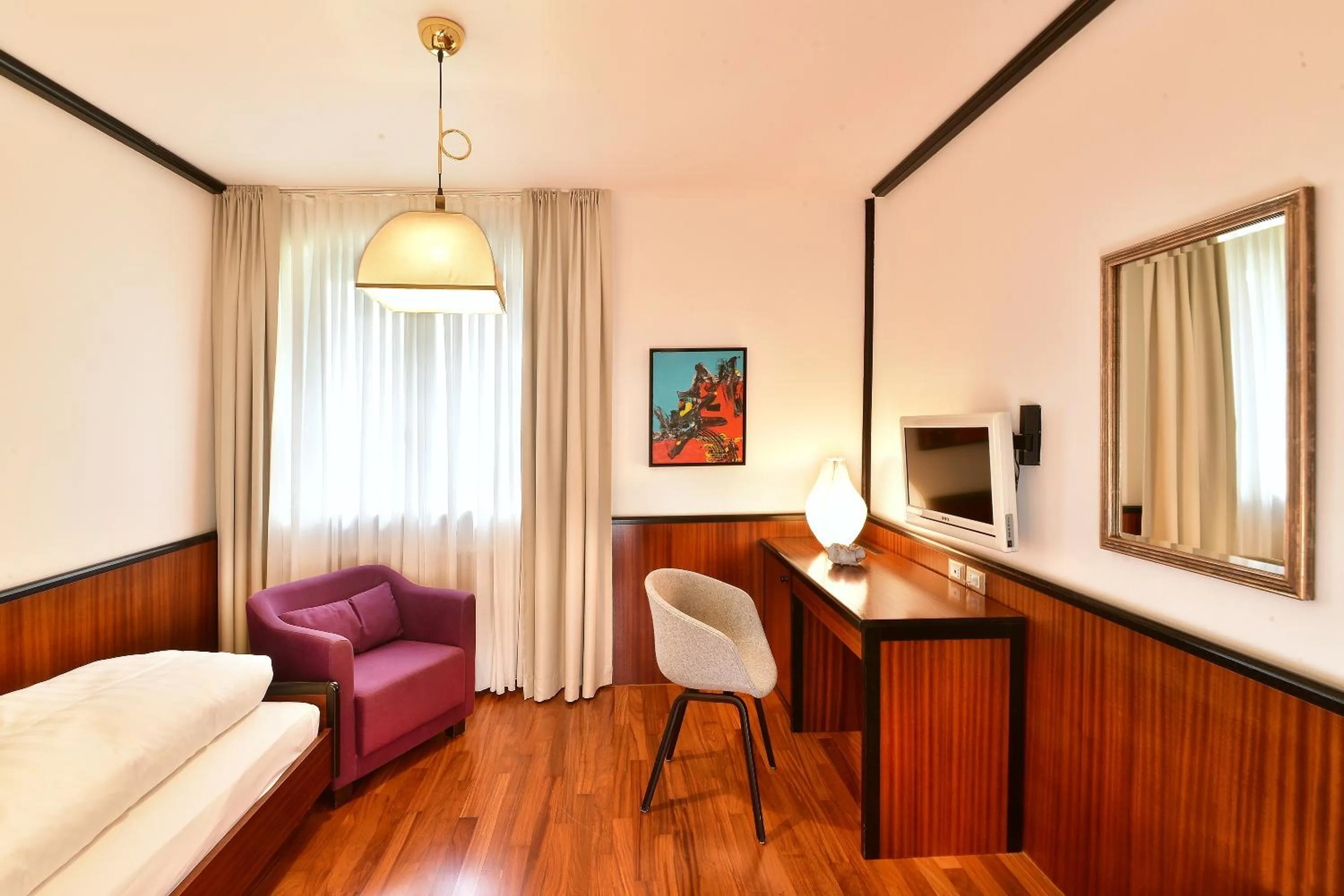 Seating area, Bed in Hotel Juliane