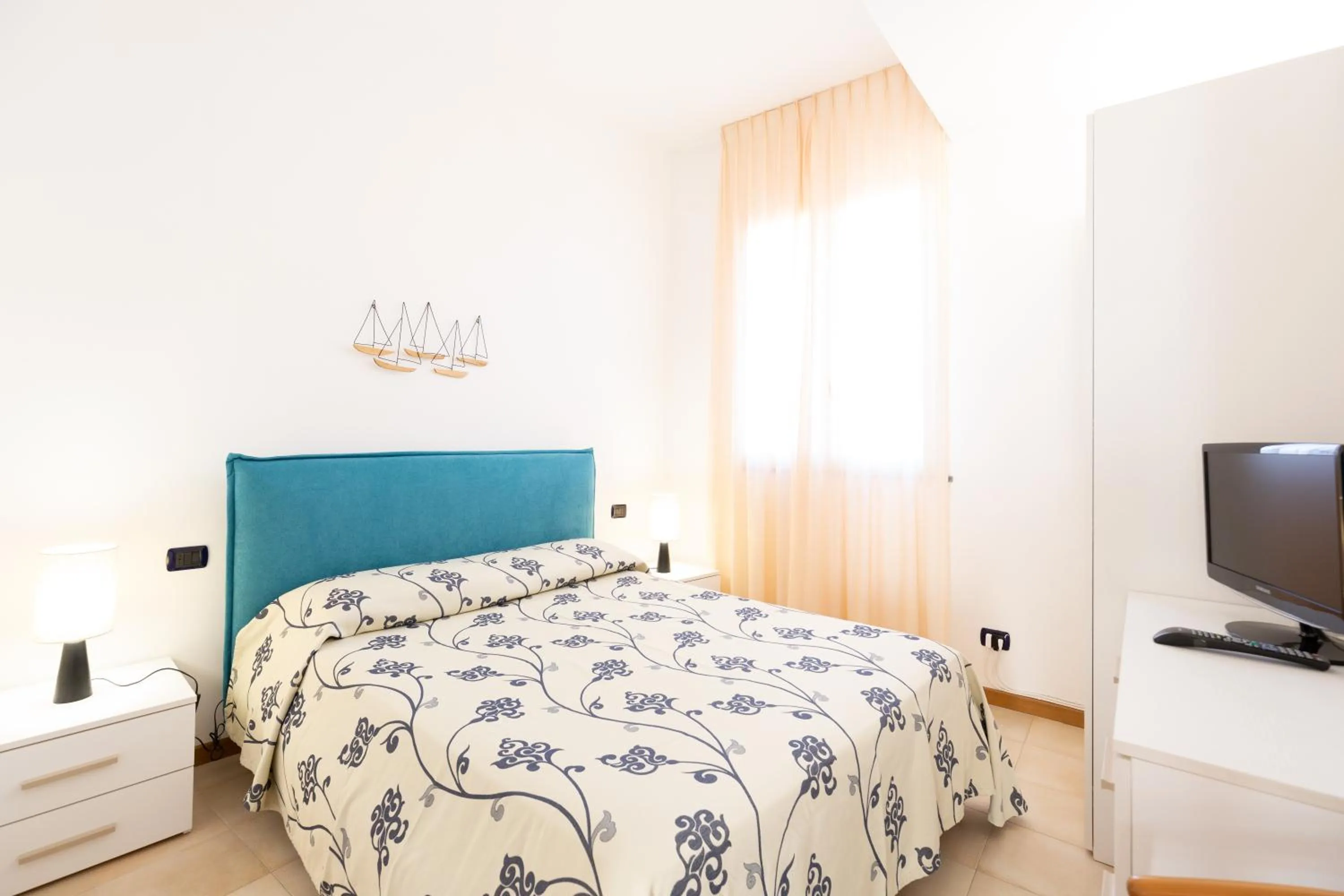 Photo of the whole room, Bed in Riviera Residence