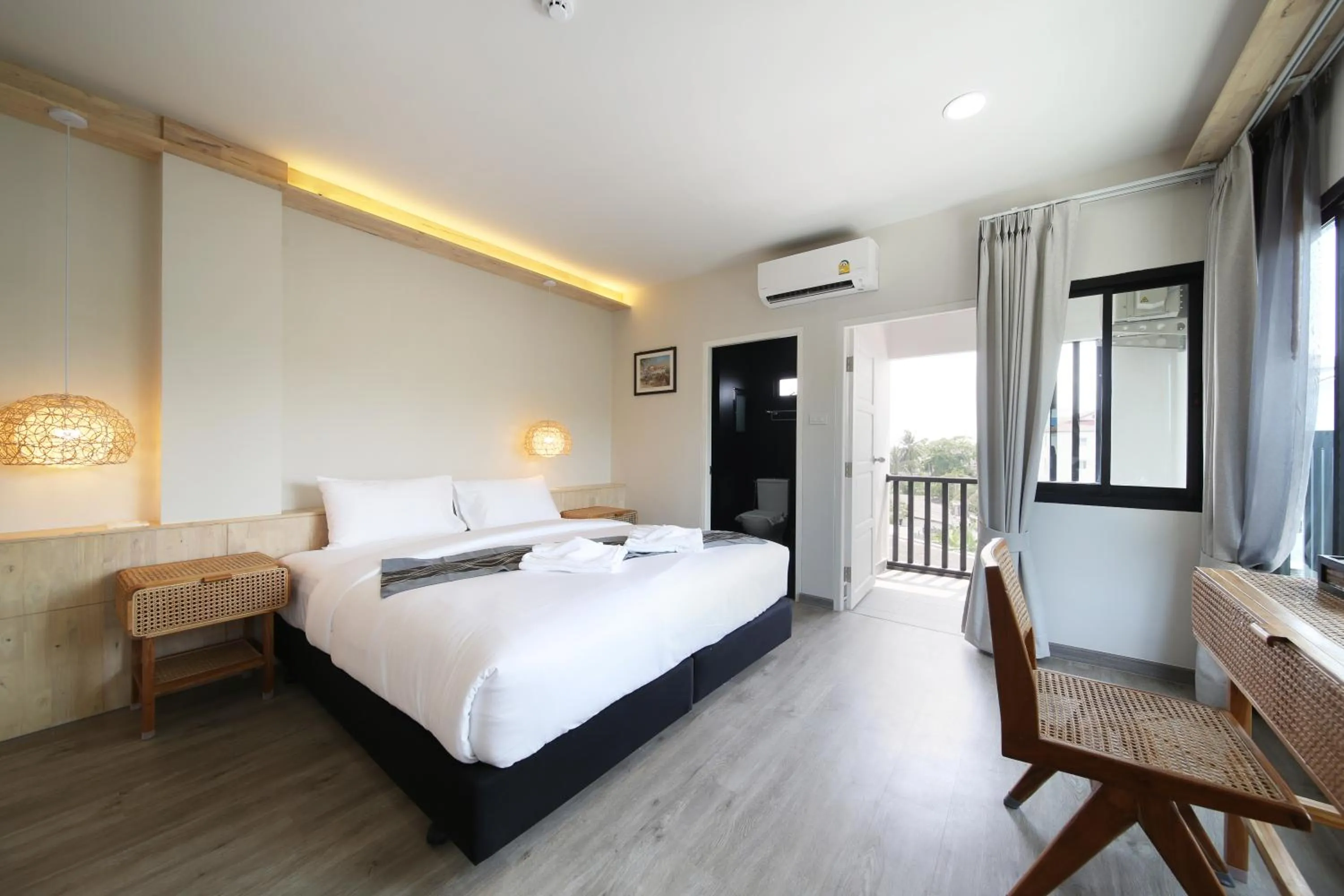 Bed in The Wood Pattani Hotel