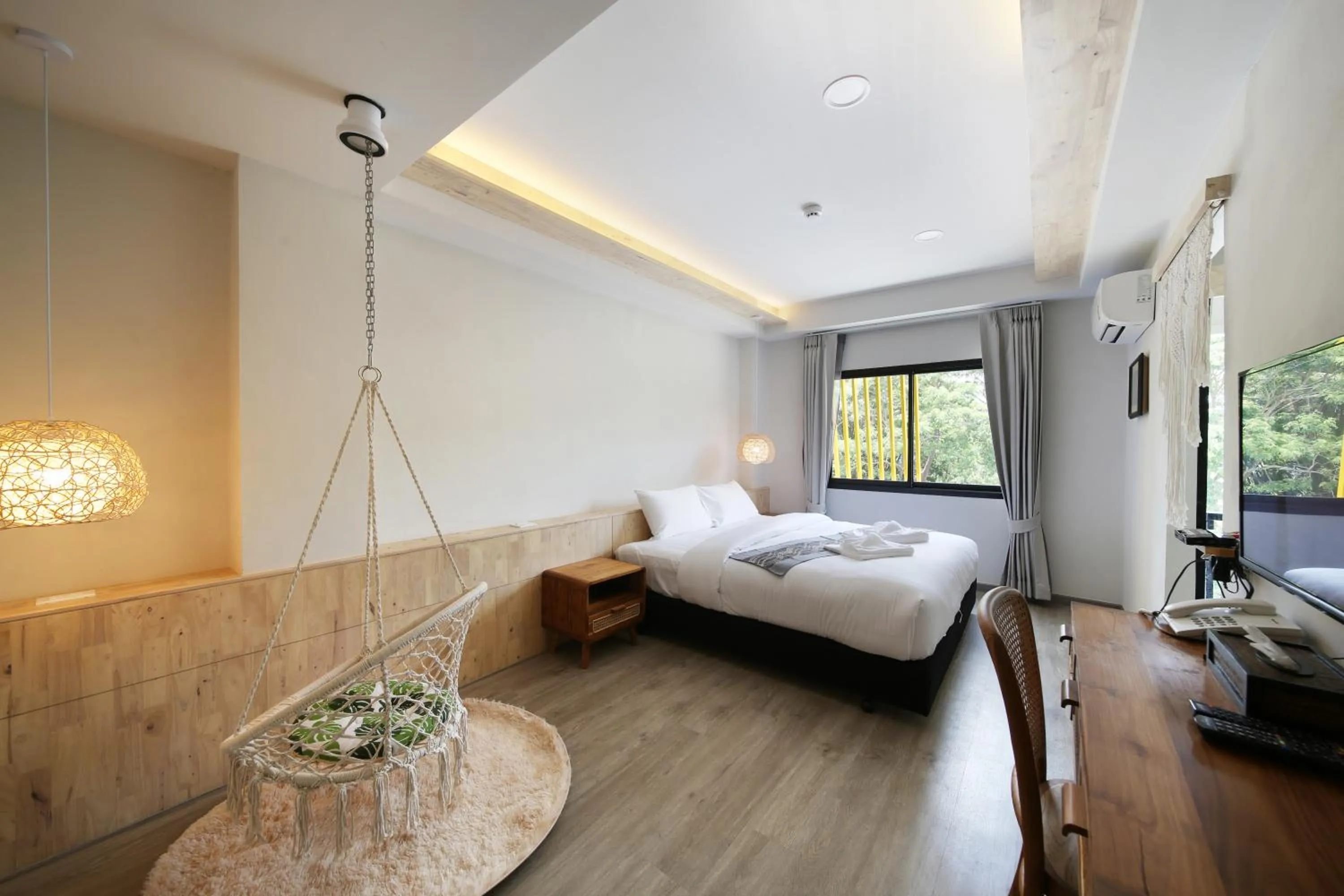 Bed in The Wood Pattani Hotel