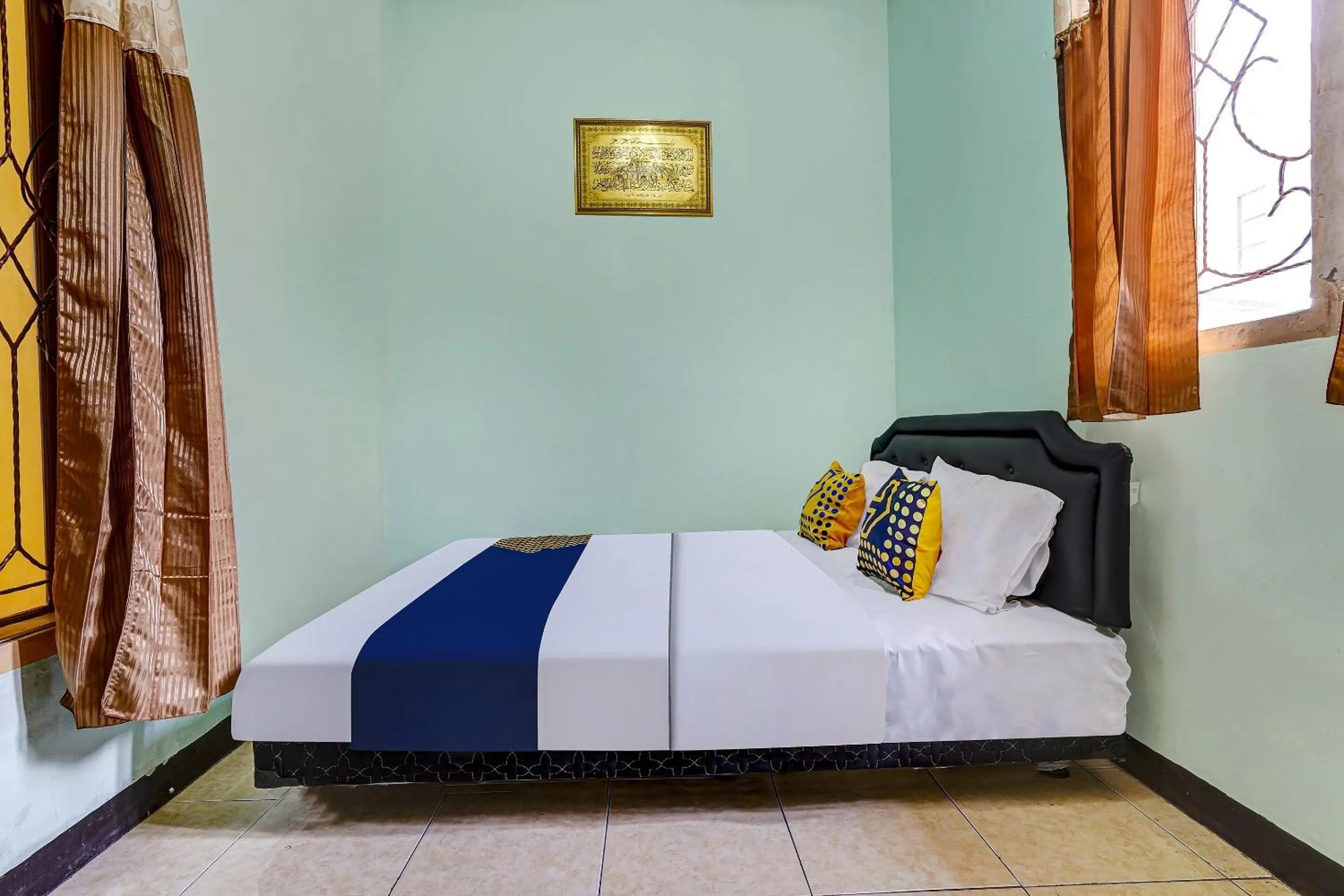 Bedroom in SPOT ON 91159 Kost Putrana Syariah