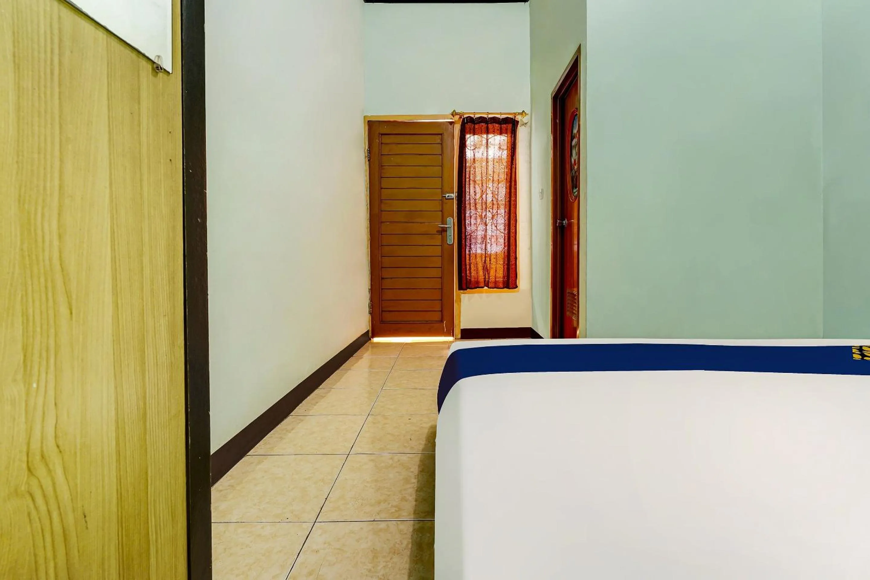 Bedroom in SPOT ON 91159 Kost Putrana Syariah