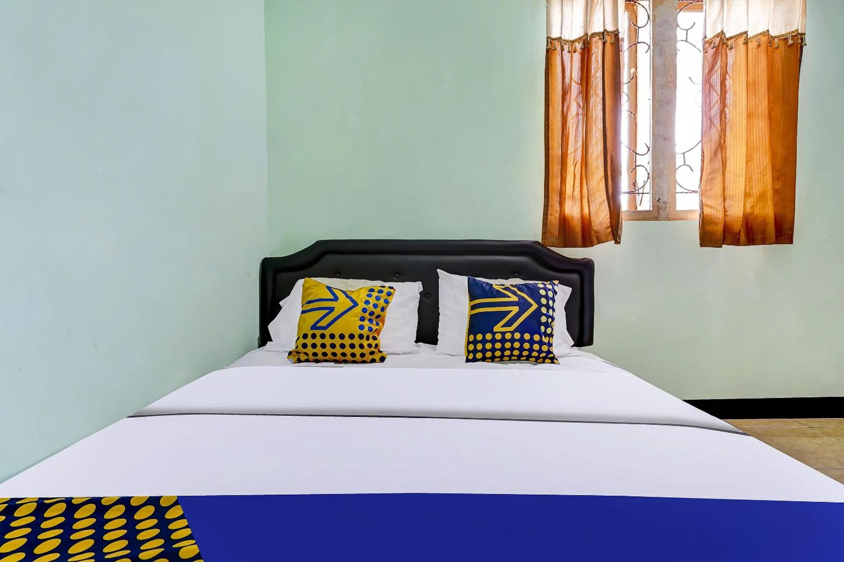 Bedroom in SPOT ON 91159 Kost Putrana Syariah