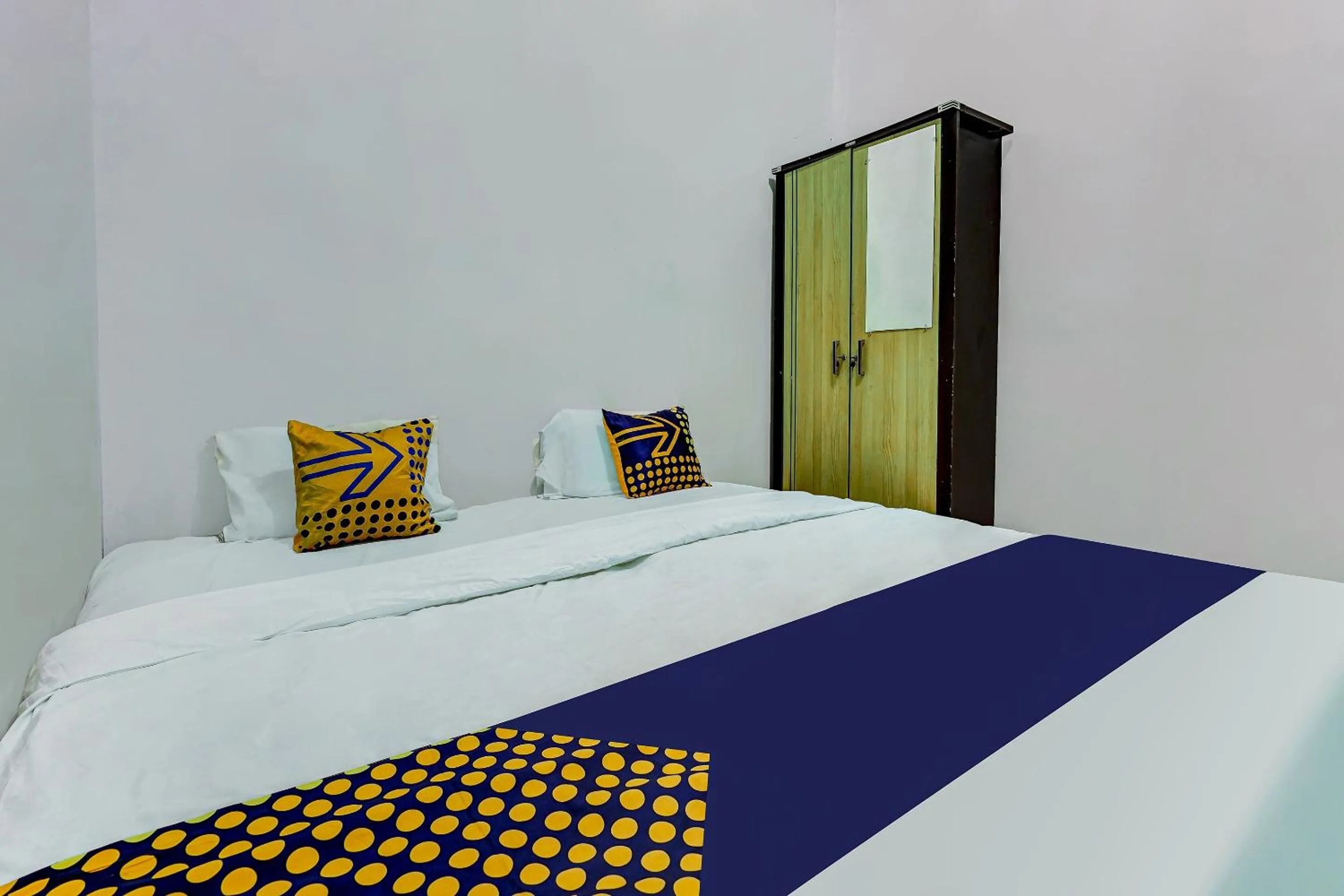 Bedroom in SPOT ON 91159 Kost Putrana Syariah