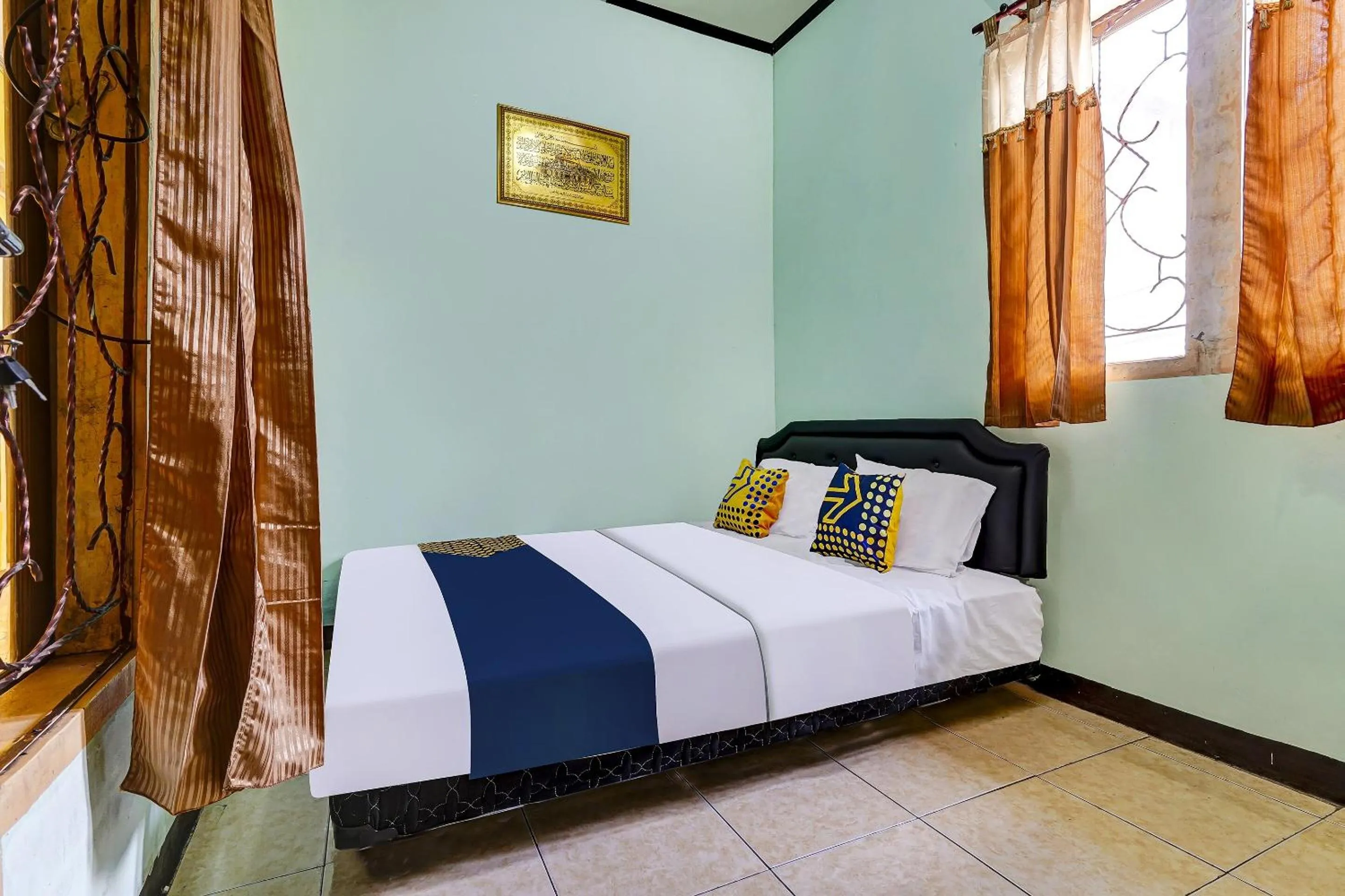 Bedroom in SPOT ON 91159 Kost Putrana Syariah